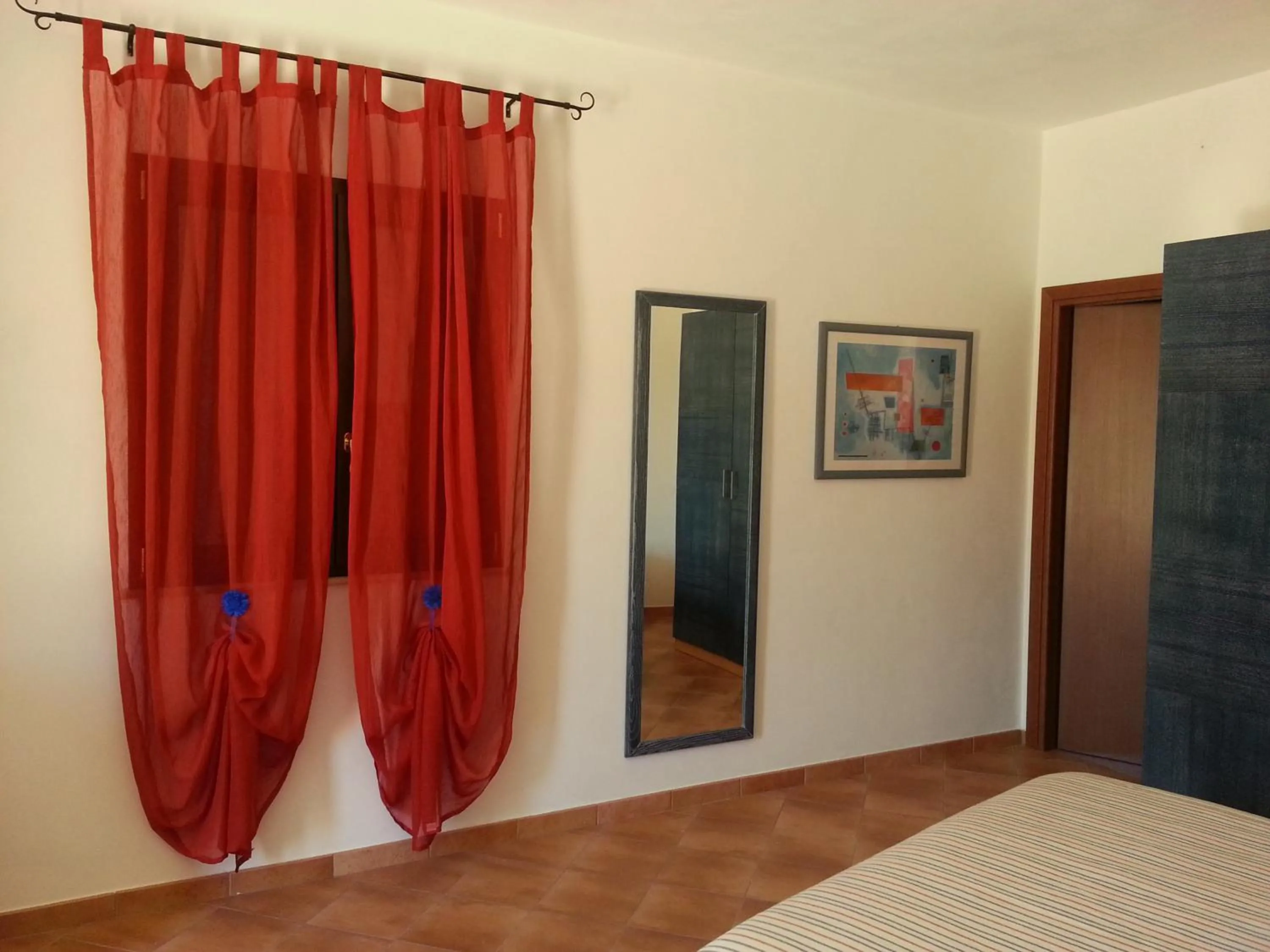 Seating area, Bed in La Casetta di Sara