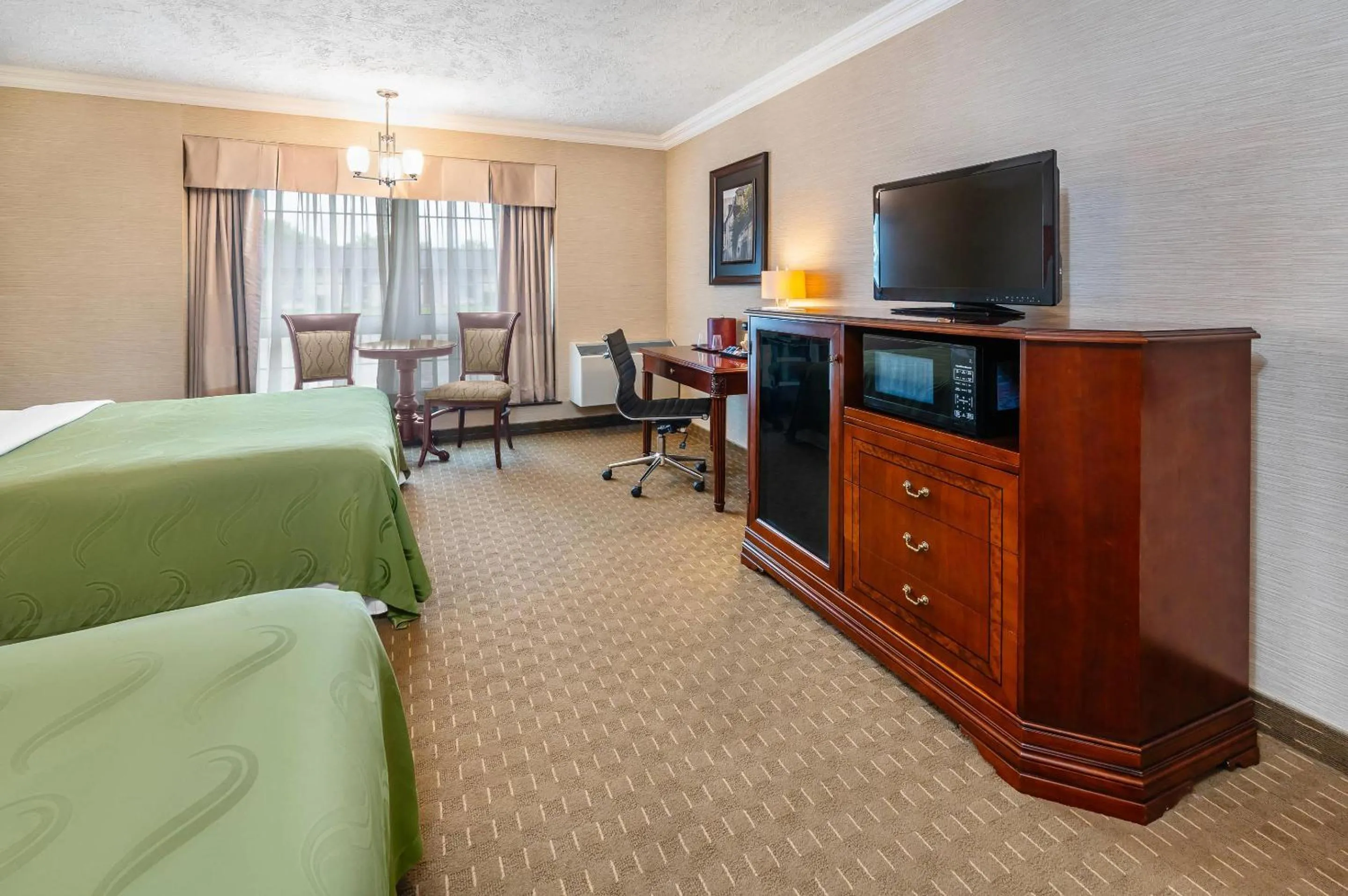 Bedroom in Rodeway Inn Festival
