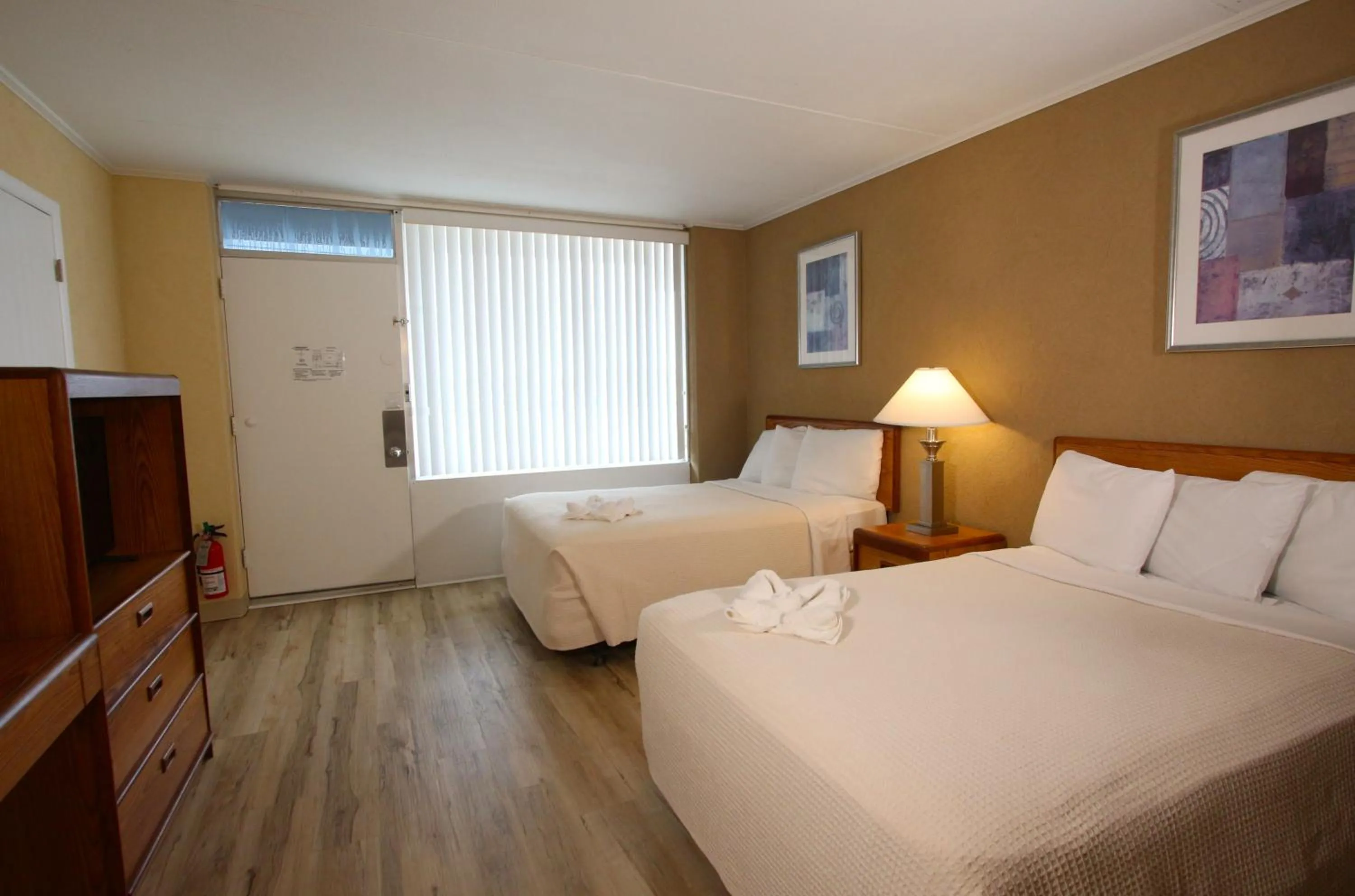 Bed in Crusader Oceanfront Resort