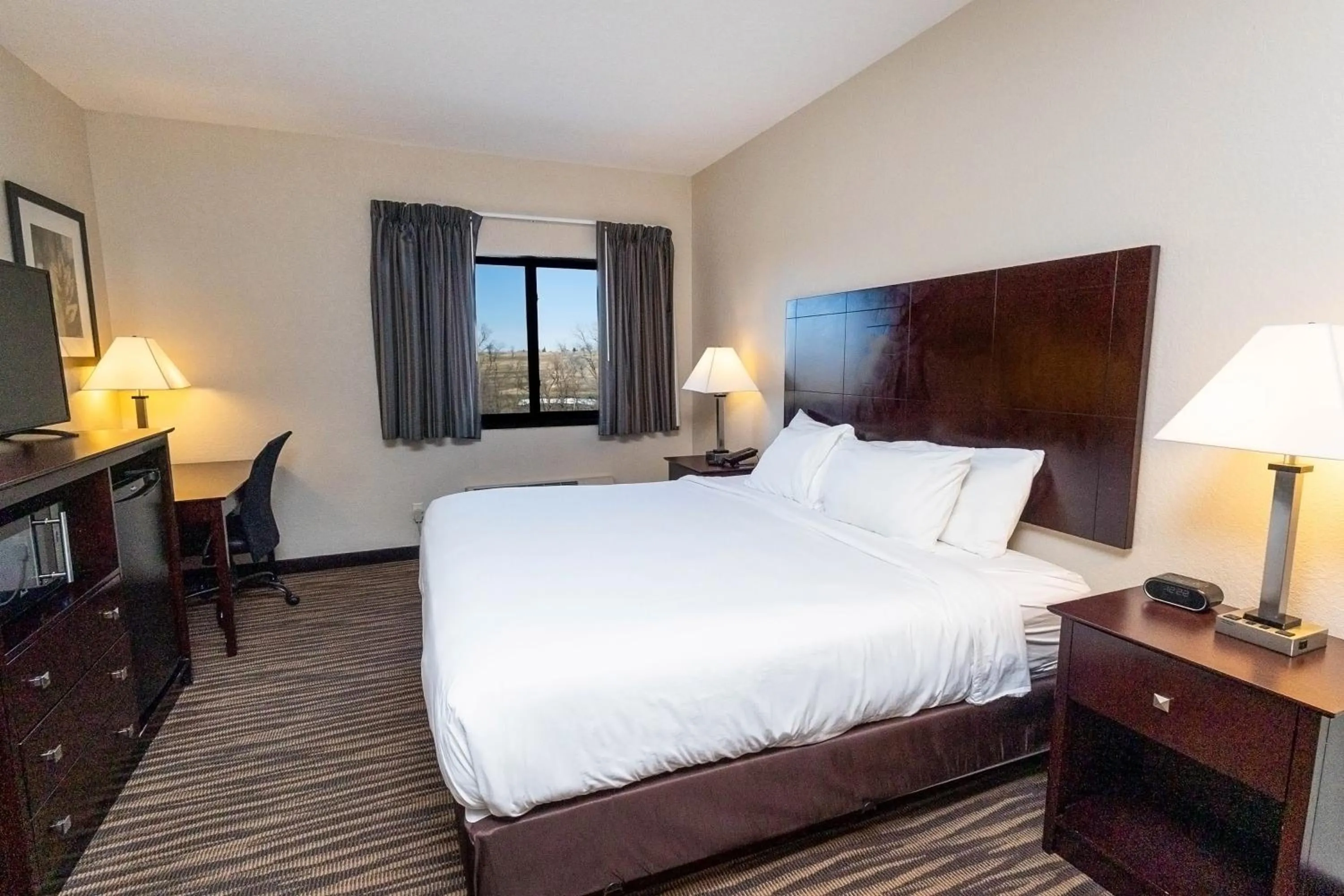 Bed in Cobblestone Inn & Suites Maryville