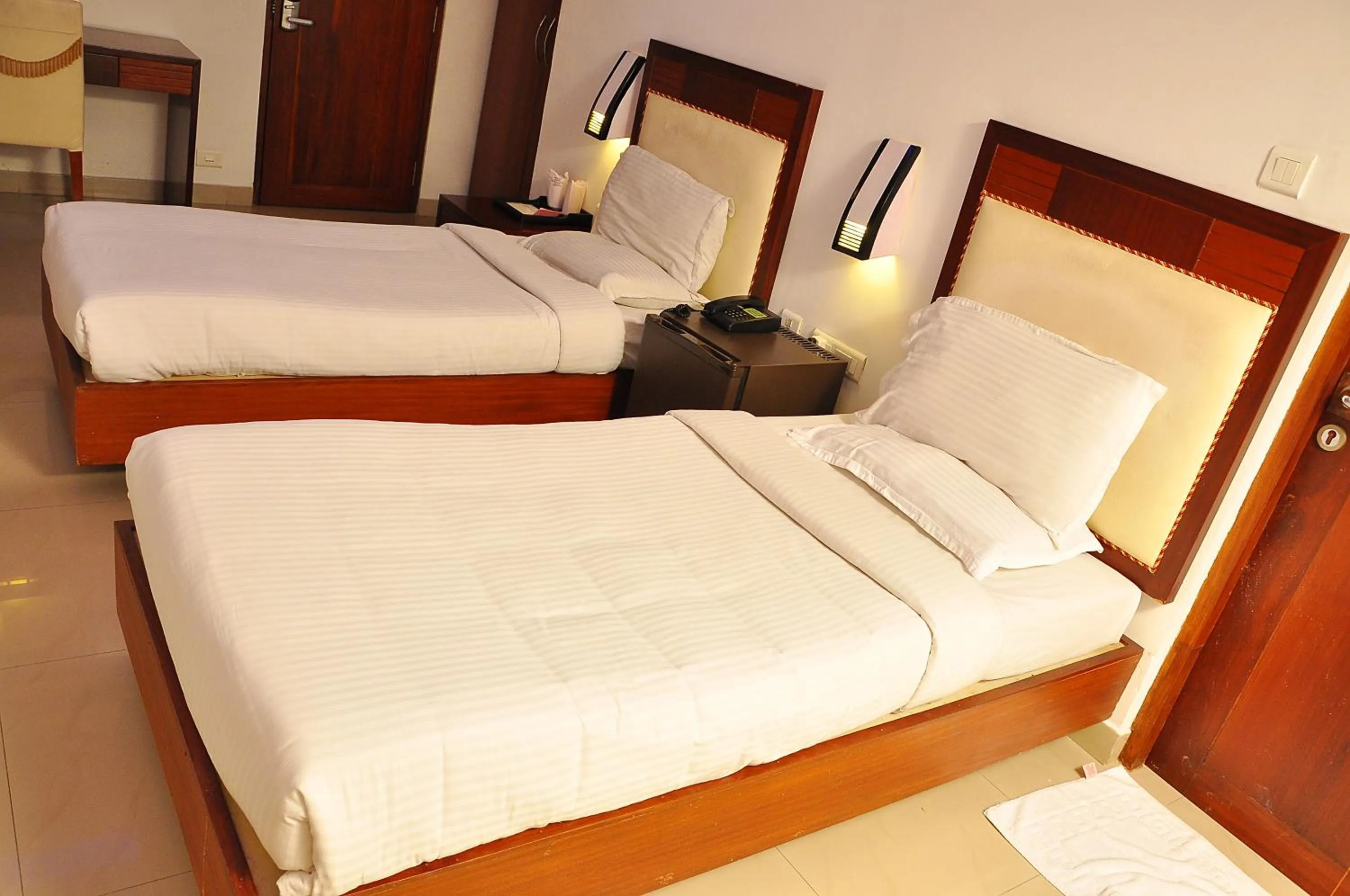 Bed in Hotel Luciya