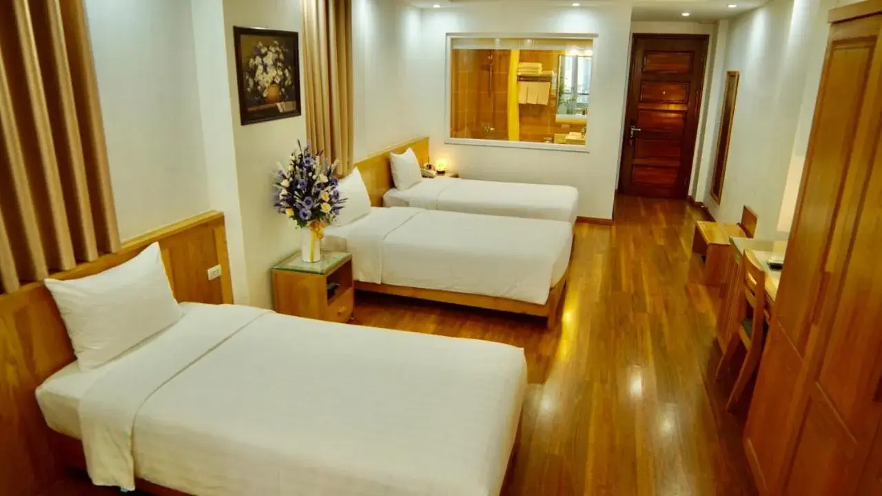 Bed in Blue Hanoi Hotel Bed in Blue Hanoi Hotel