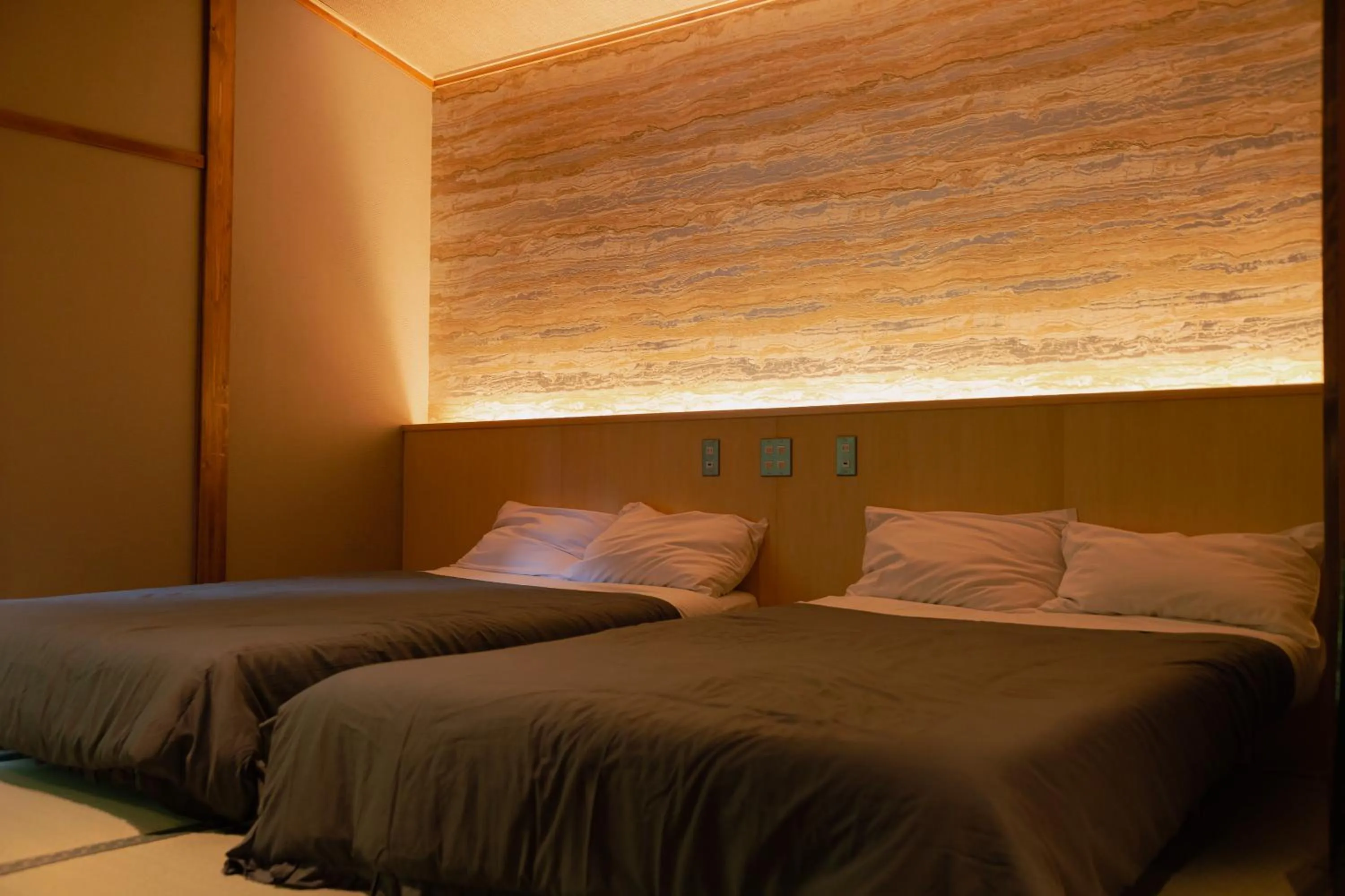 Photo of the whole room, Bed in Nukumorino-yado Komanoyu