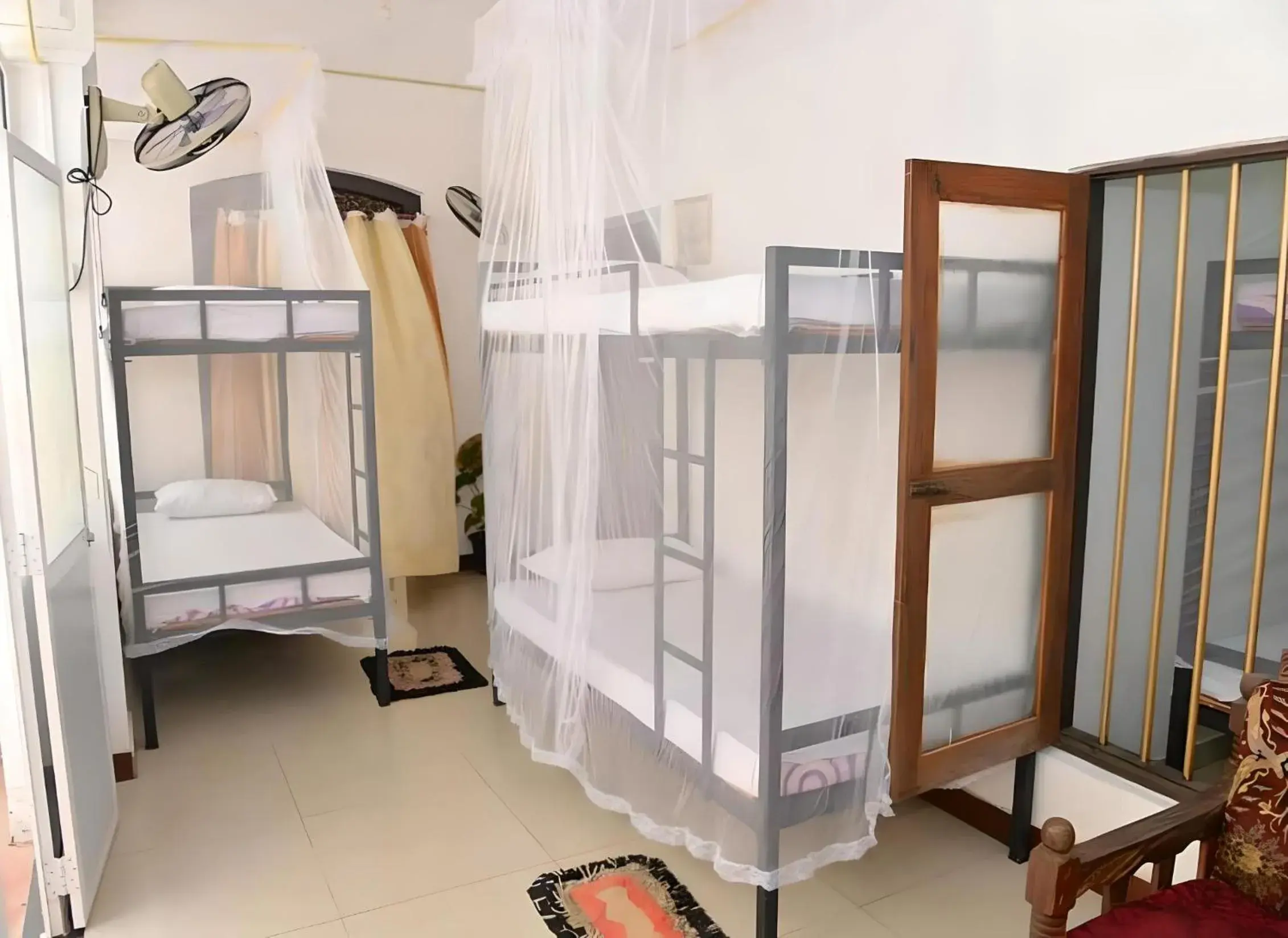 Bunk Bed in Female Dormitory Room in Traveller's Hostel Hikkaduwa Bunk Bed in Female Dormitory Room in Traveller's Hostel Hikkaduwa