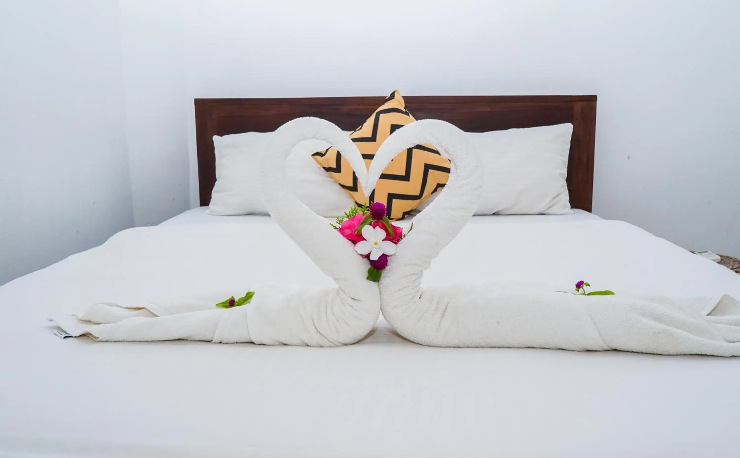 Bed in Dinuda Resort Bed in Dinuda Resort