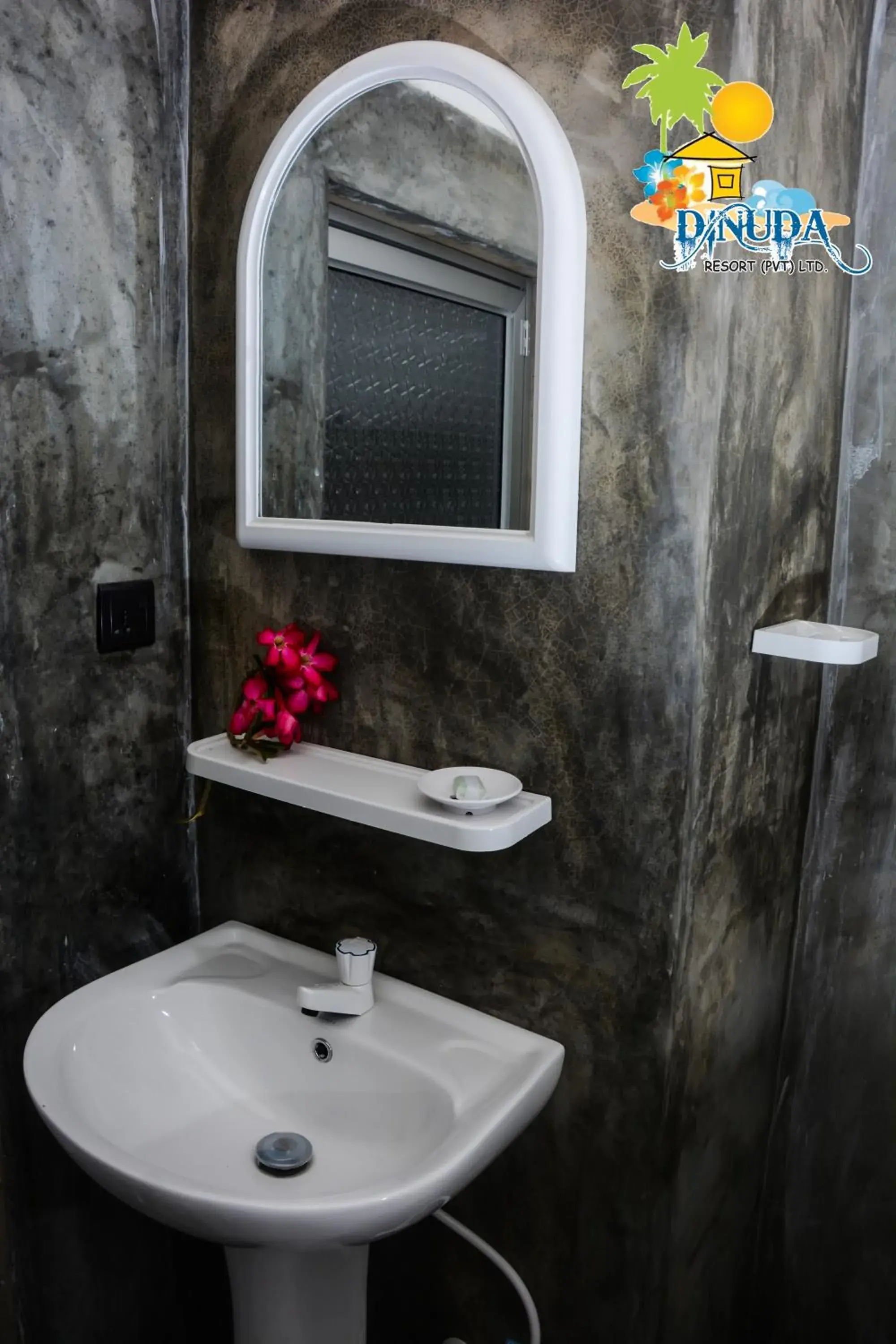 Bathroom in Dinuda Lagoon Hotel Bathroom in Dinuda Lagoon Hotel