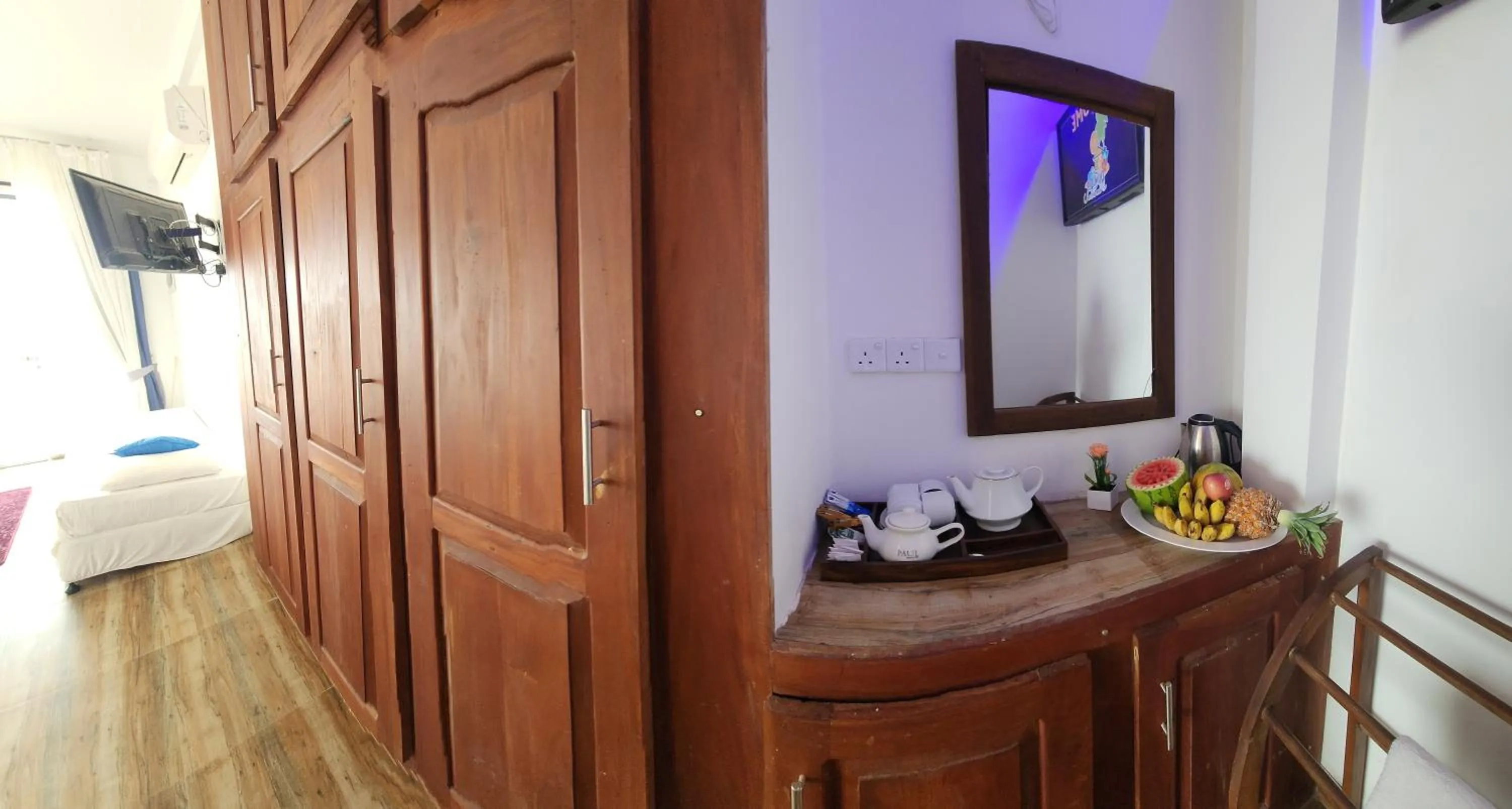 Bed in Dinuda Lagoon Hotel