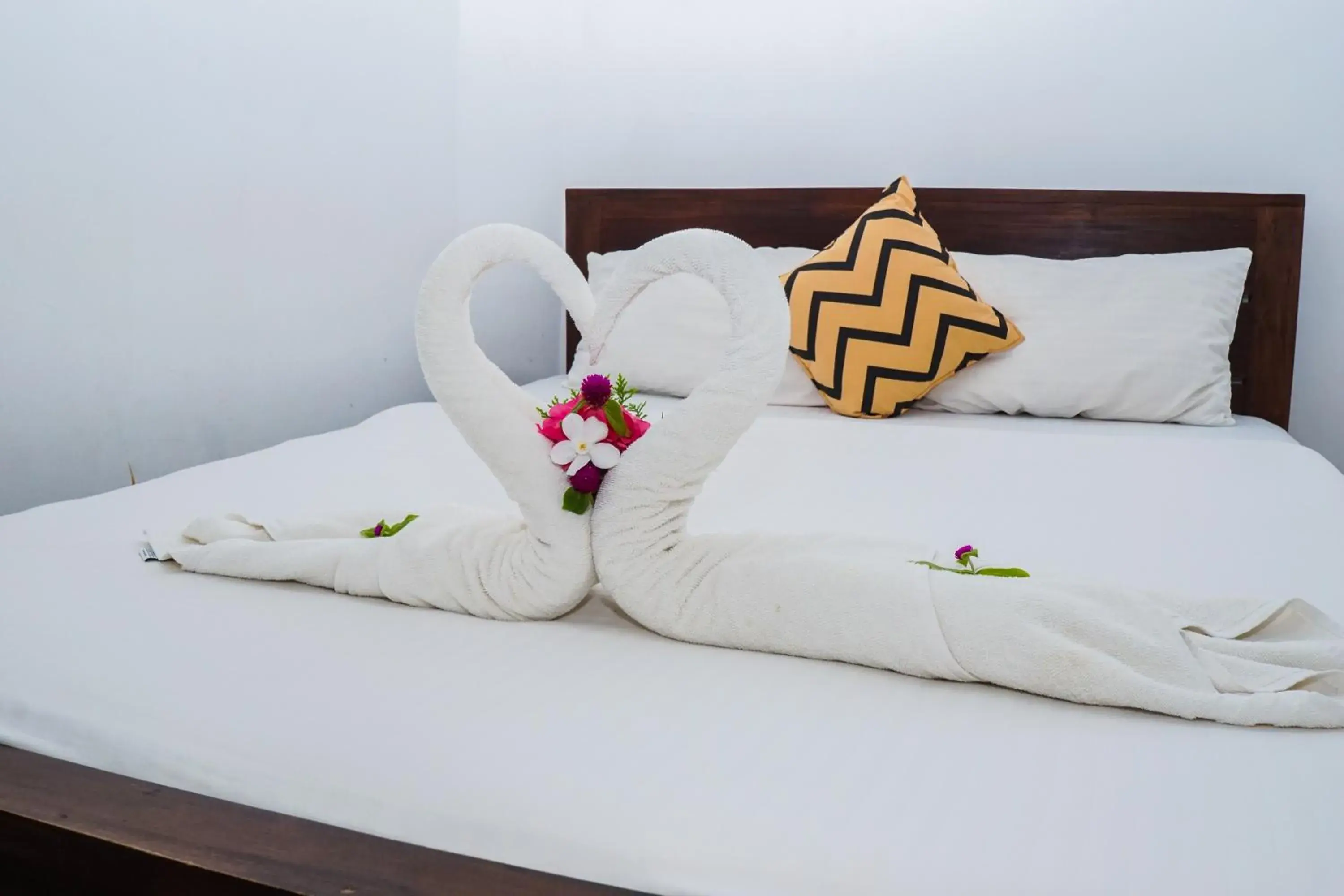 Bed in Dinuda Resort Bed in Dinuda Resort