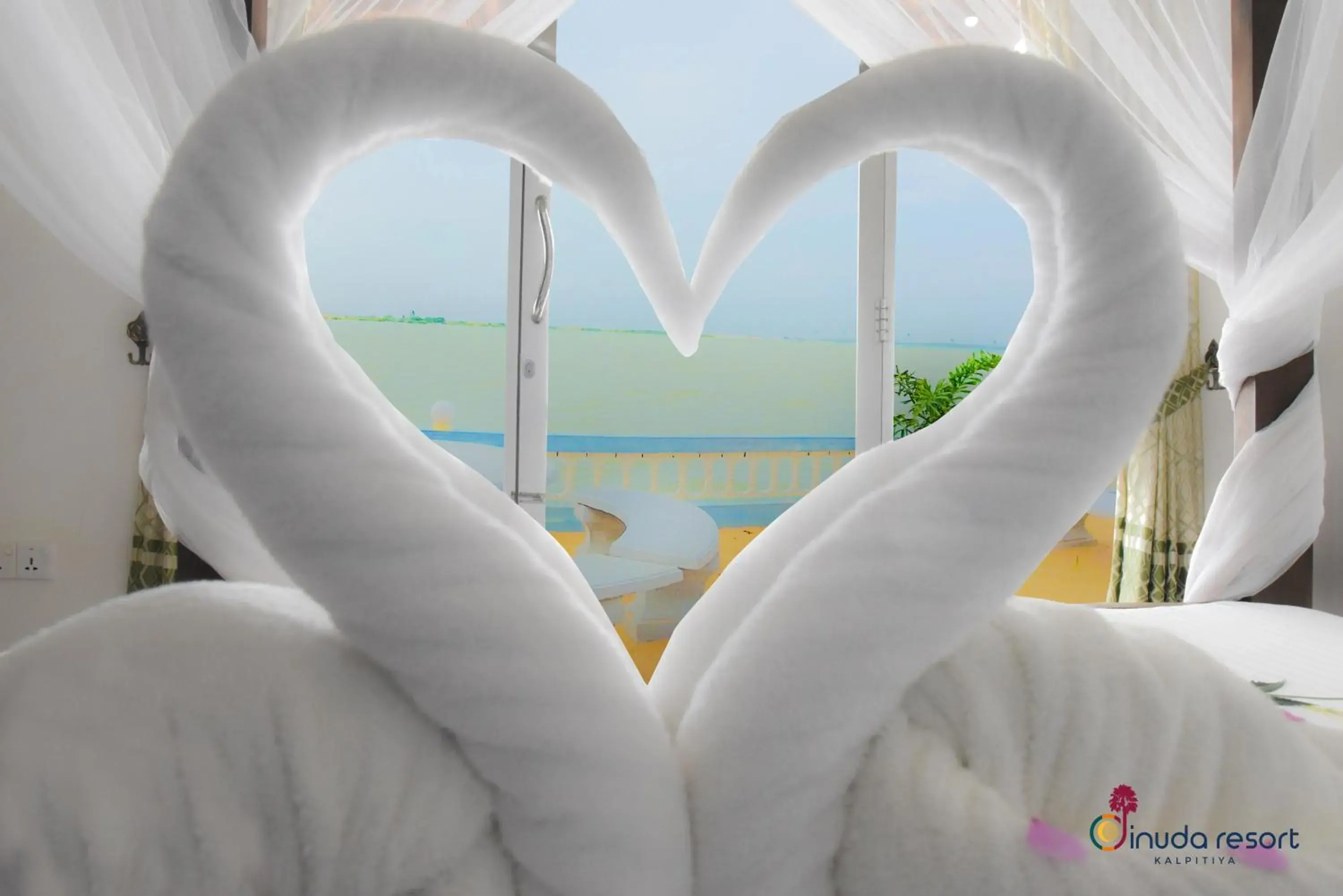 Bed in Dinuda Lagoon Hotel Bed in Dinuda Lagoon Hotel