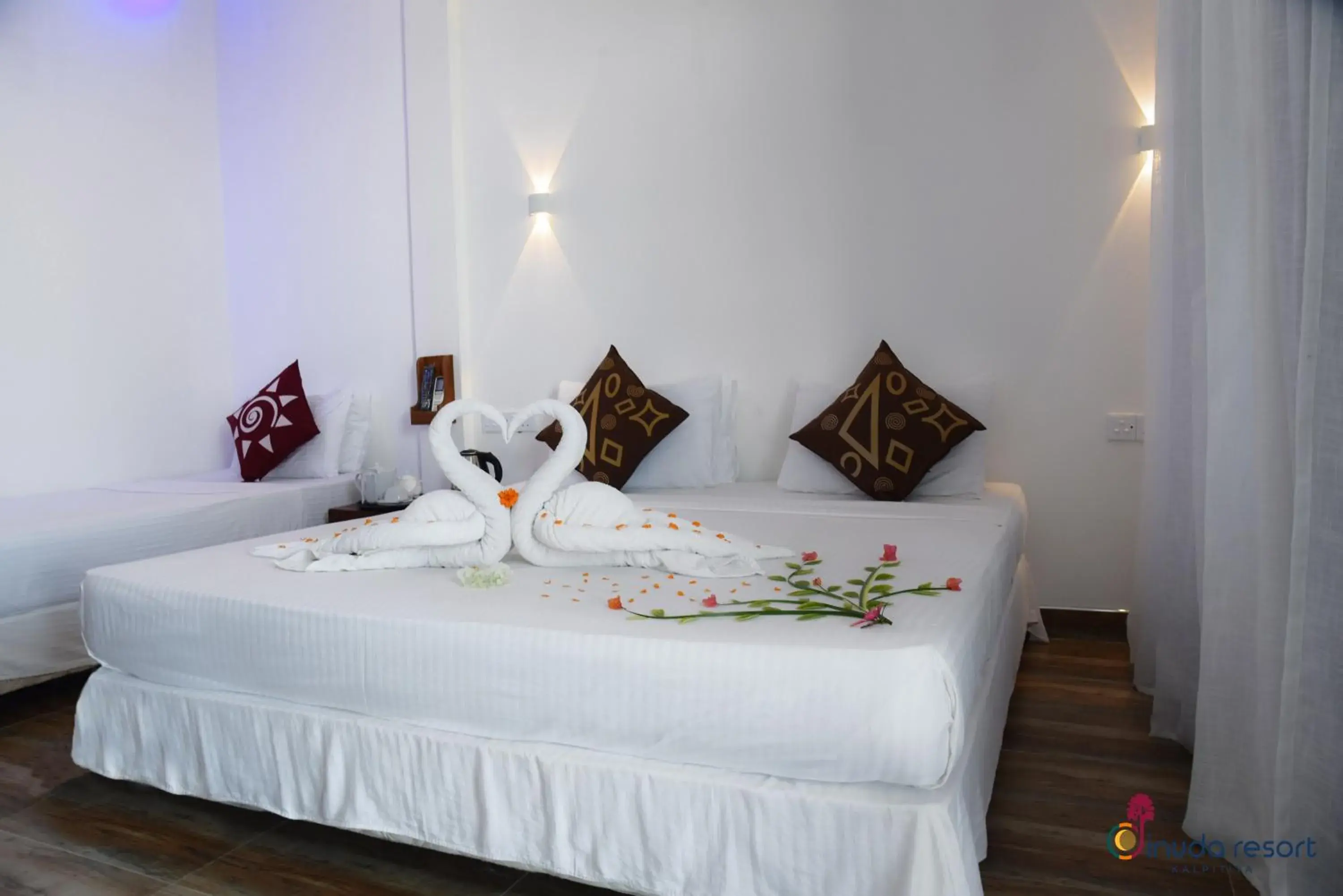 Bed in Dinuda Resort Bed in Dinuda Resort