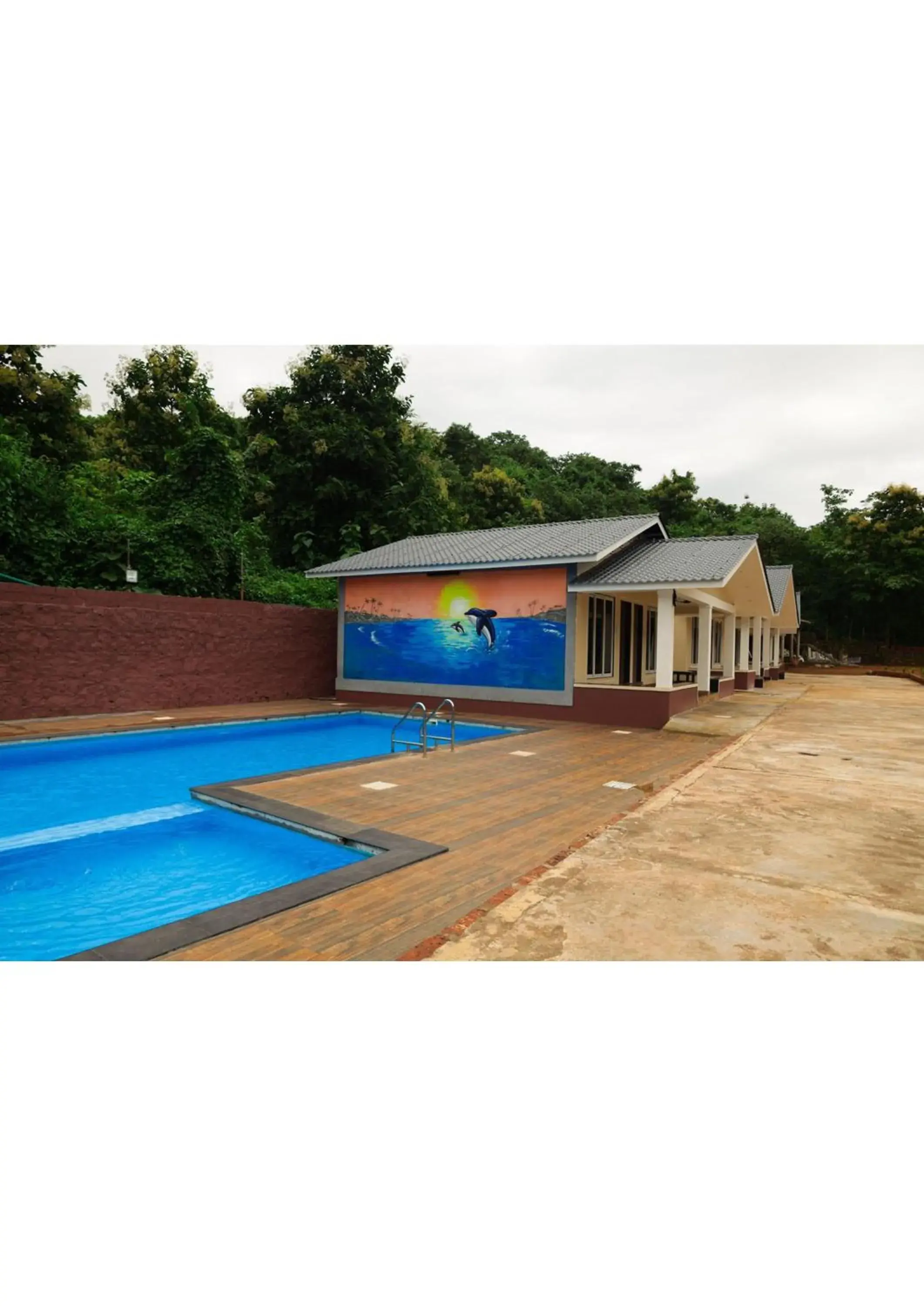 Swimming pool in Nisarg Resort Swimming pool in Nisarg Resort