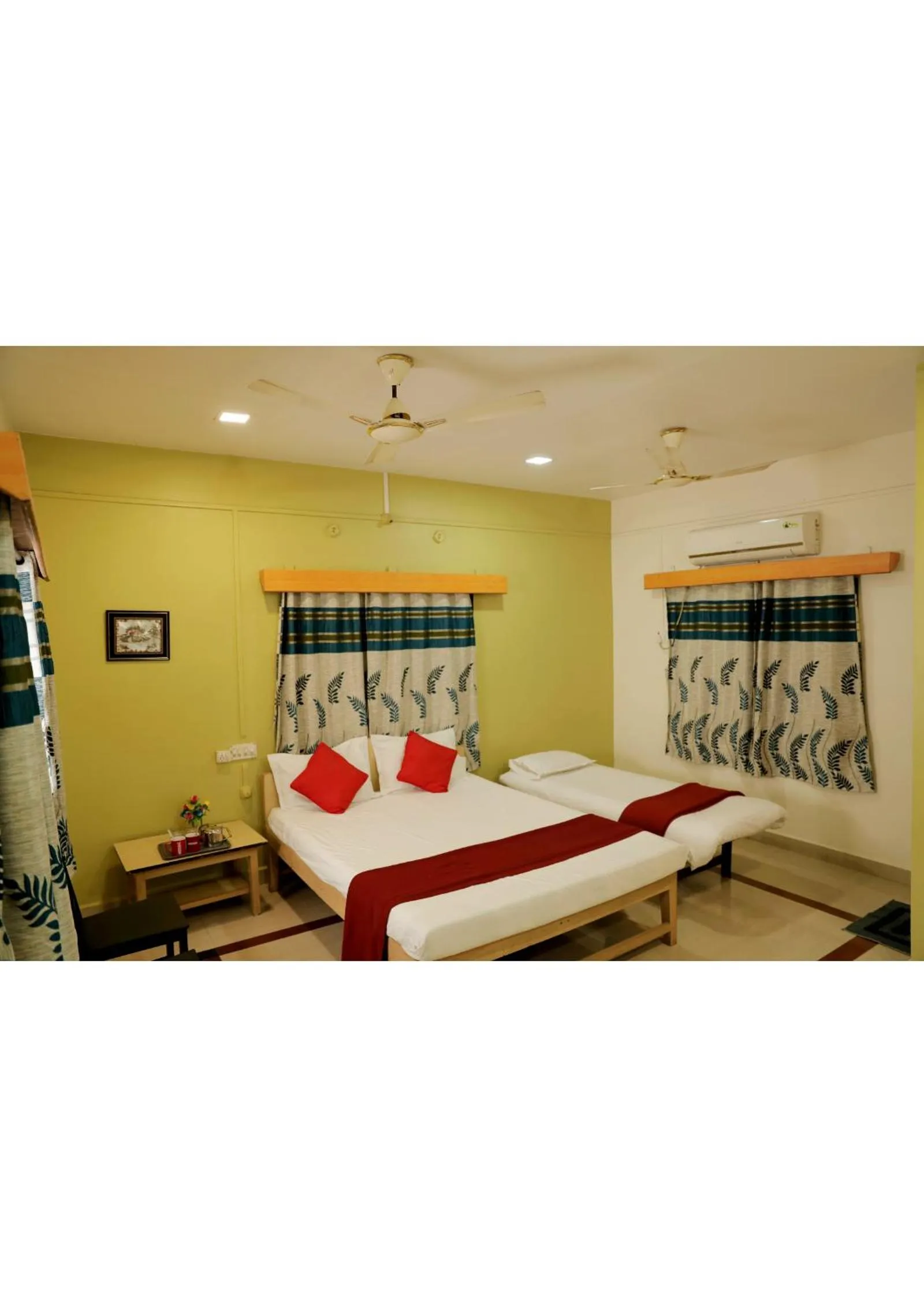 Bed in Nisarg Resort