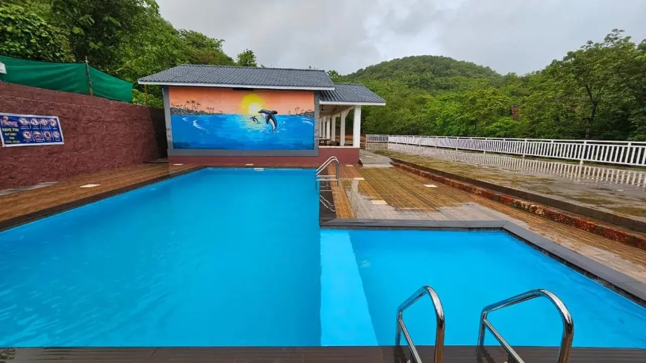 Swimming pool in Nisarg Resort Swimming pool in Nisarg Resort