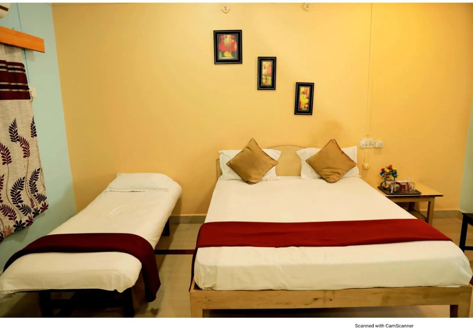 Bed in Nisarg Resort