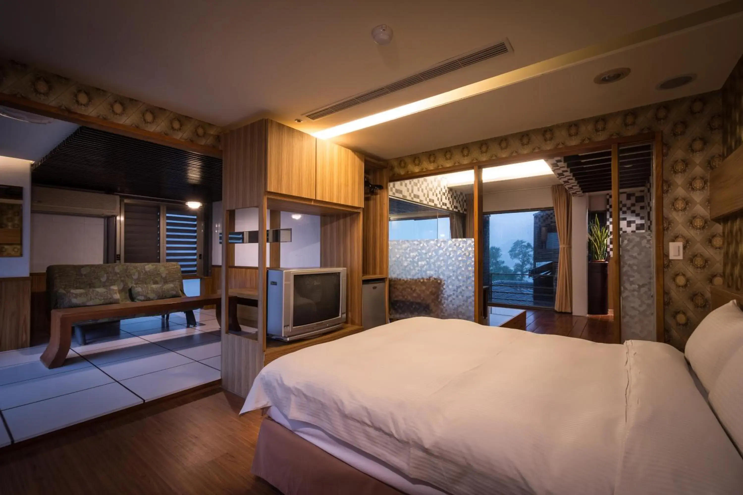 Bed in WULAI SungLyu Spring Resort