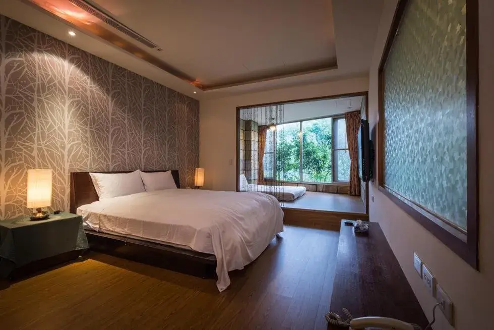 Bed in WULAI SungLyu Spring Resort