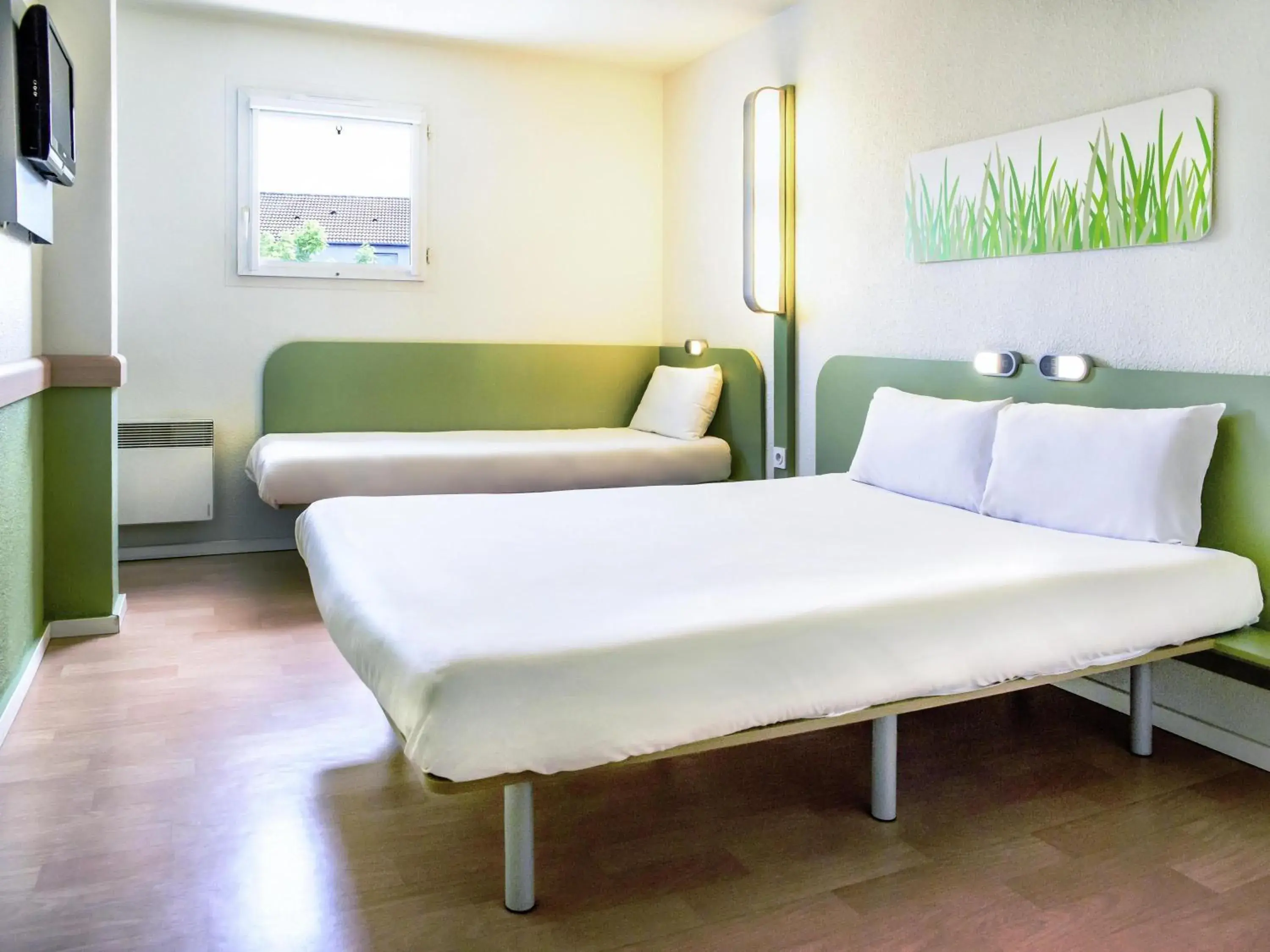 Bedroom in ibis budget Valenciennes Petite-Forêt Bedroom in ibis budget Valenciennes Petite-Forêt