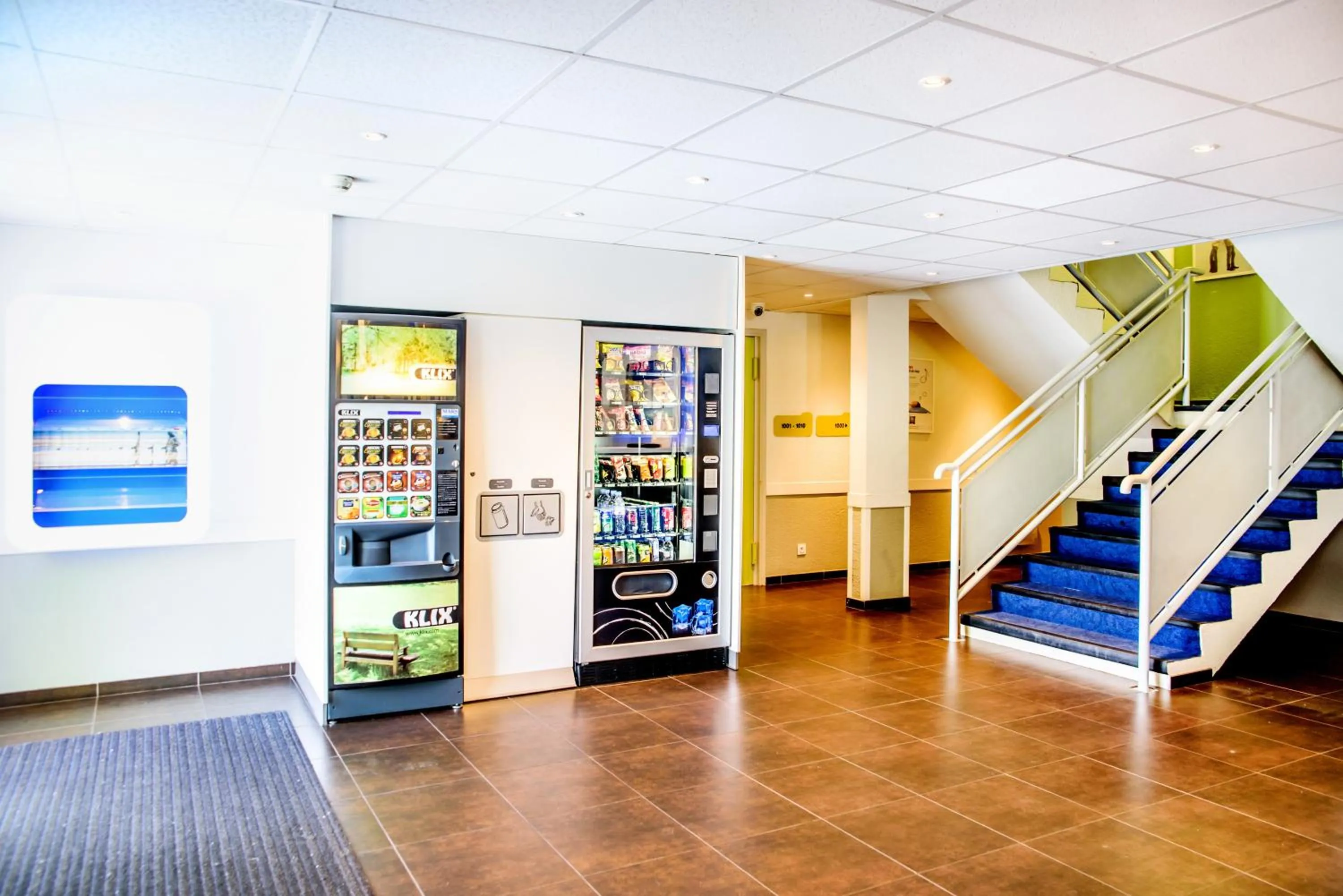 Lobby or reception in ibis budget Valenciennes Petite-Forêt