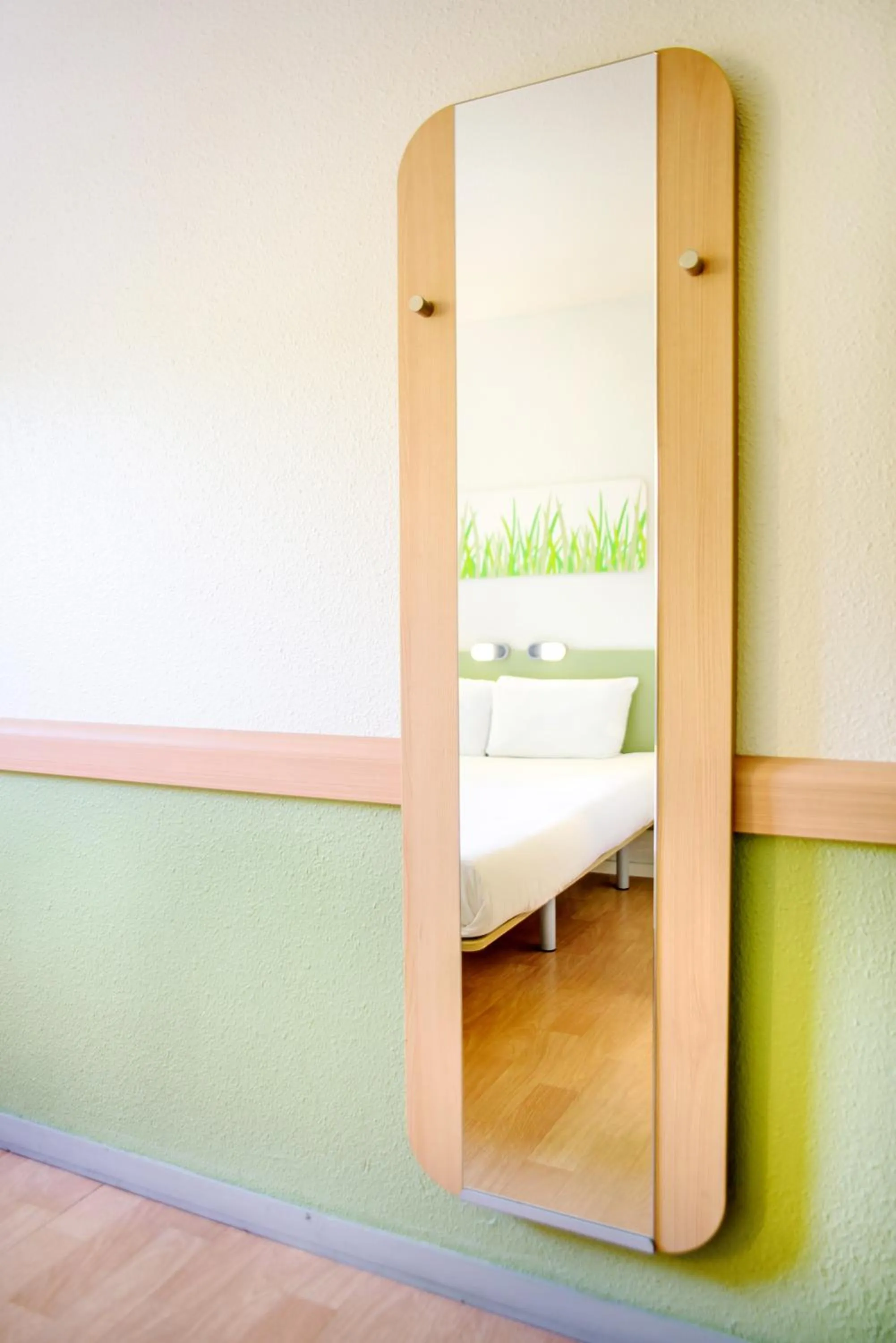 Decorative detail, Bed in ibis budget Valenciennes Petite-Forêt