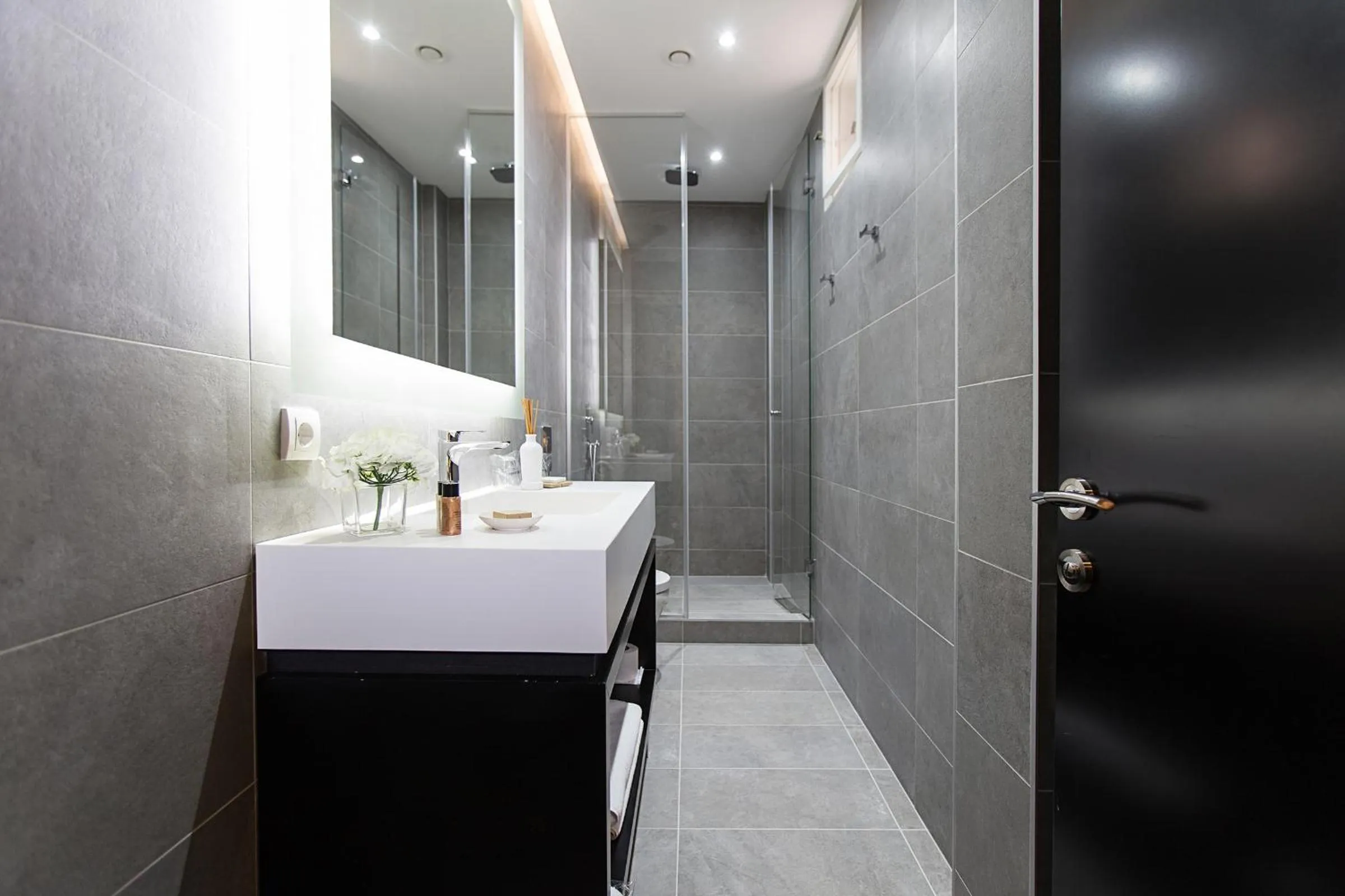Shower in Dominic Smart & Luxury Suites - Republic Square