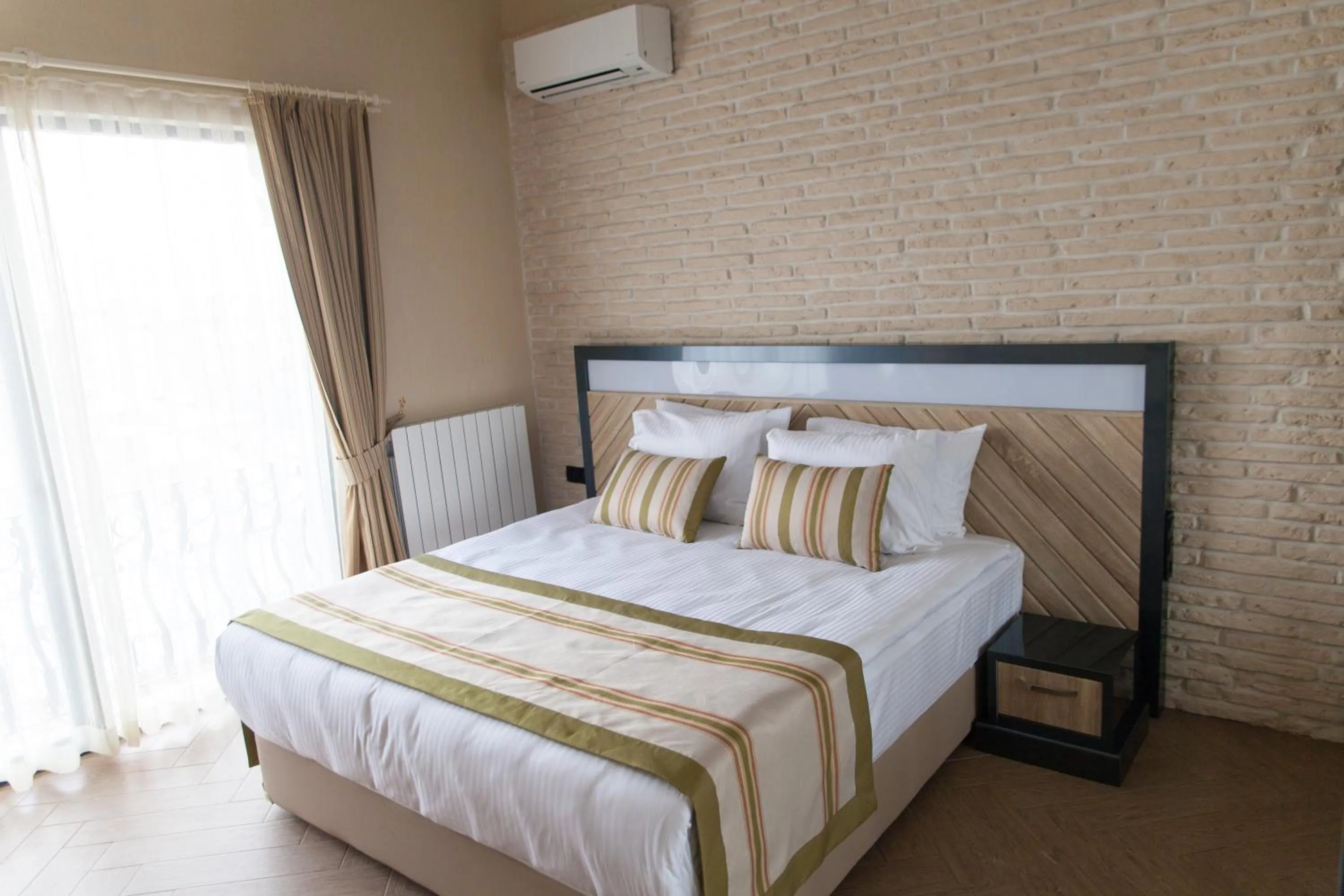 Bed in Aldino Residence