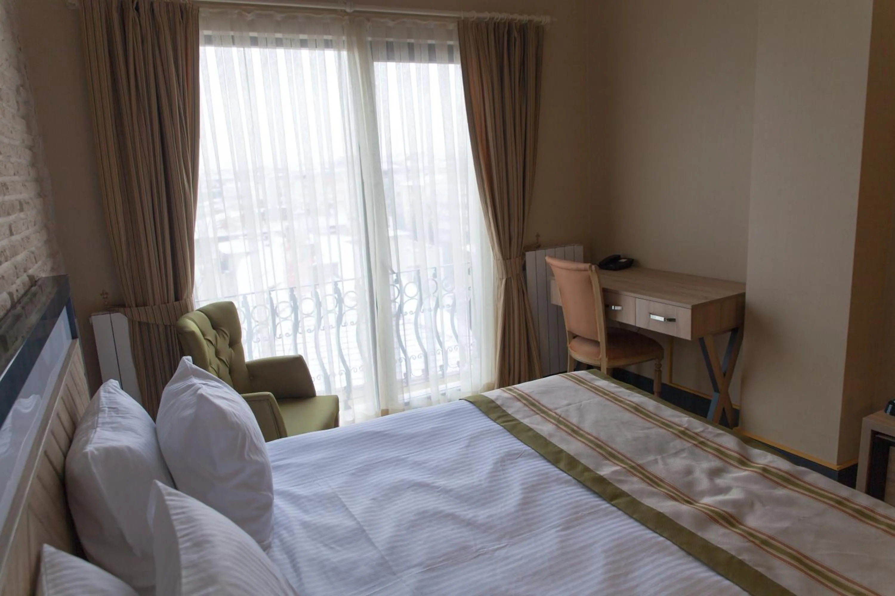 Bed in Aldino Residence