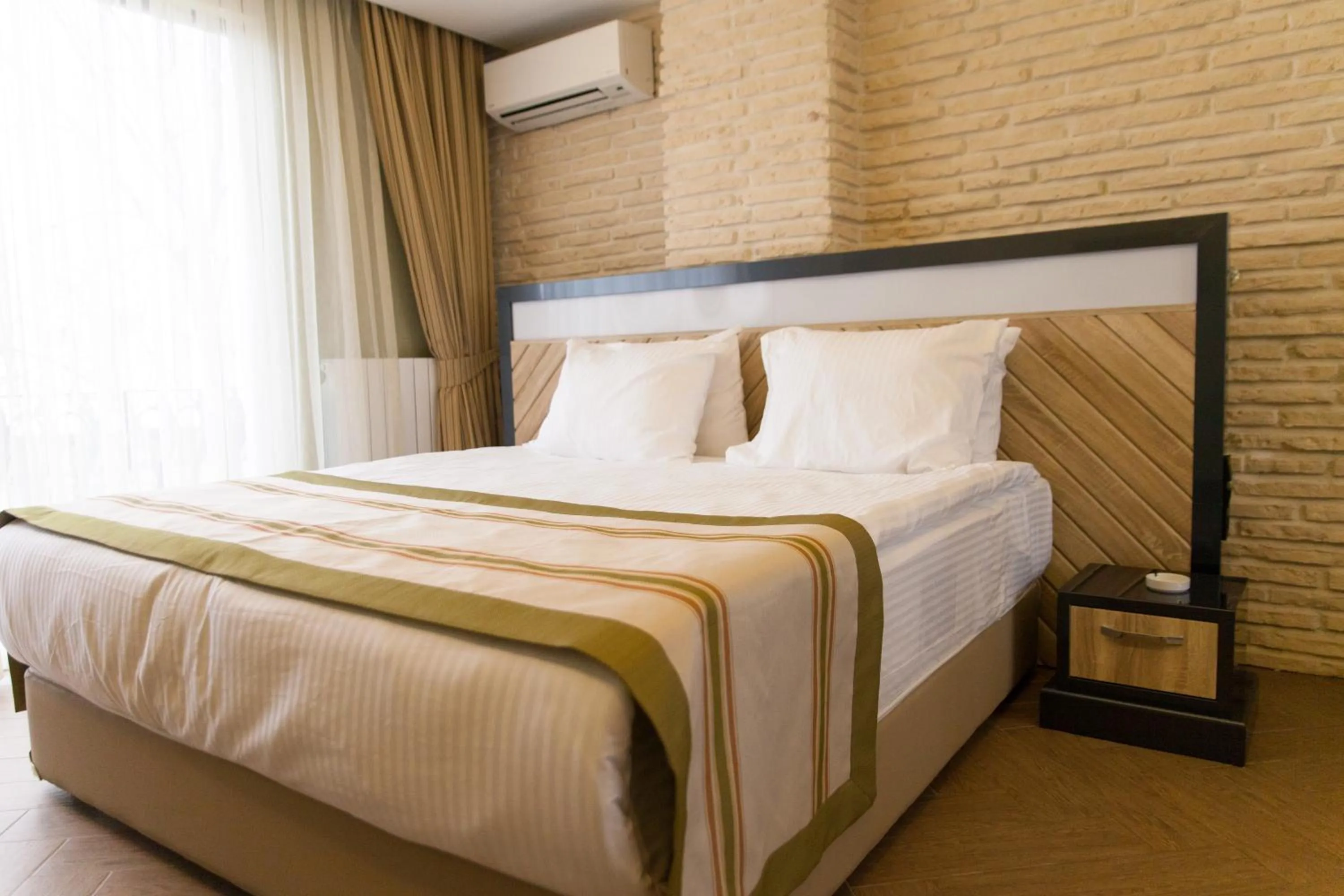 Bed in Aldino Residence