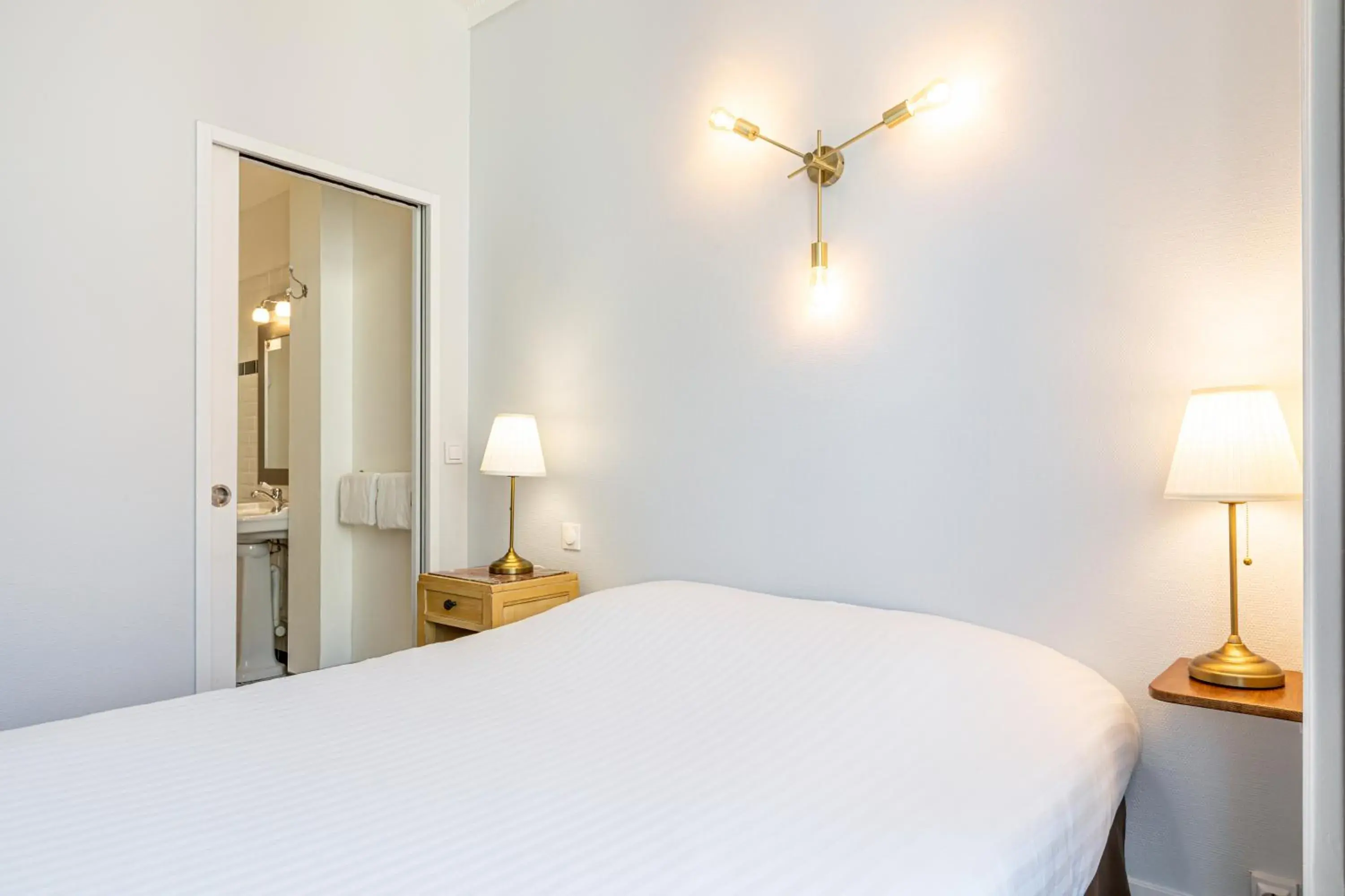 Bed in Hôtel Saint Maurice Bed in Hôtel Saint Maurice