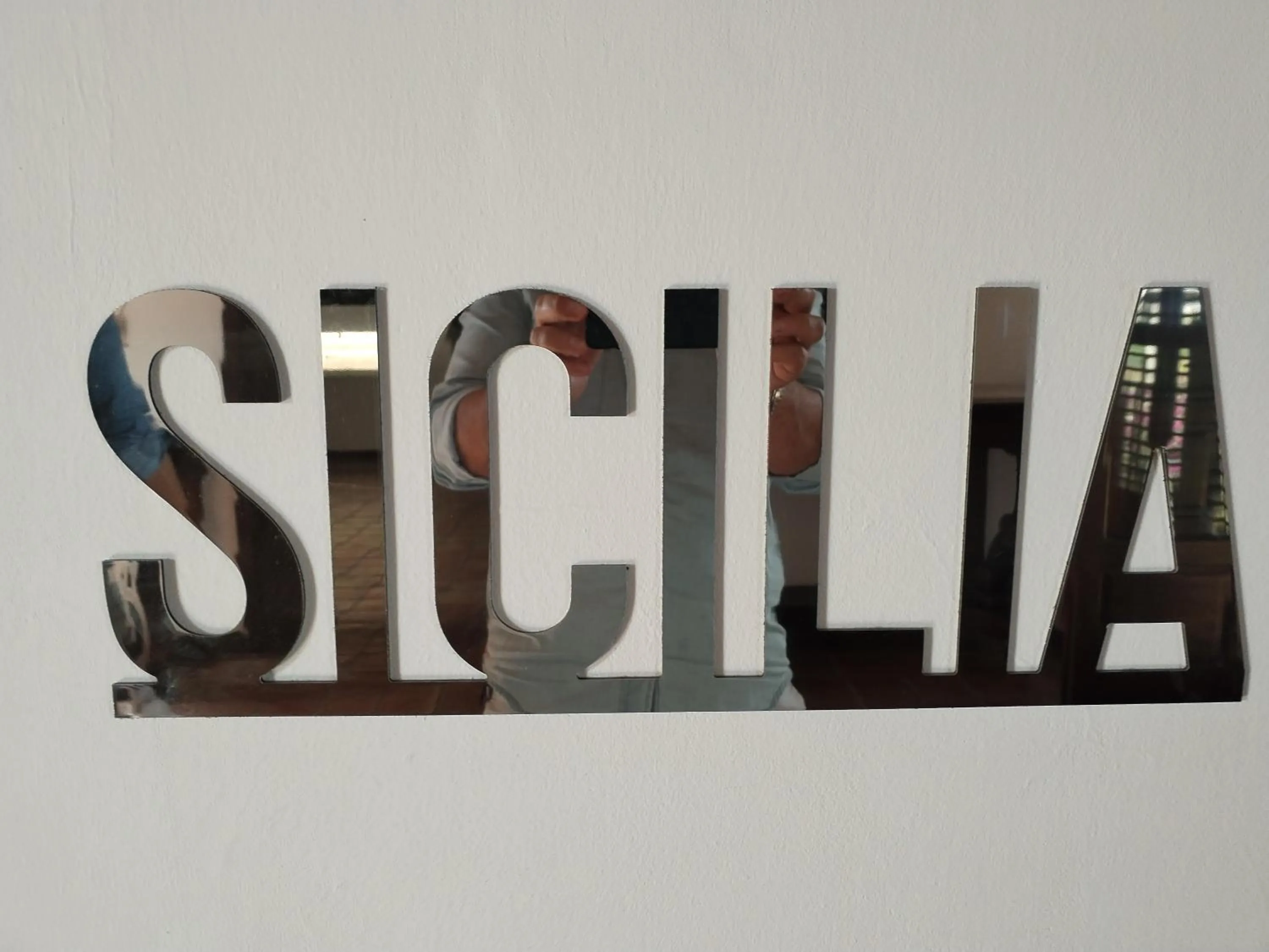 Text overlay in Alessi Suites & Studio