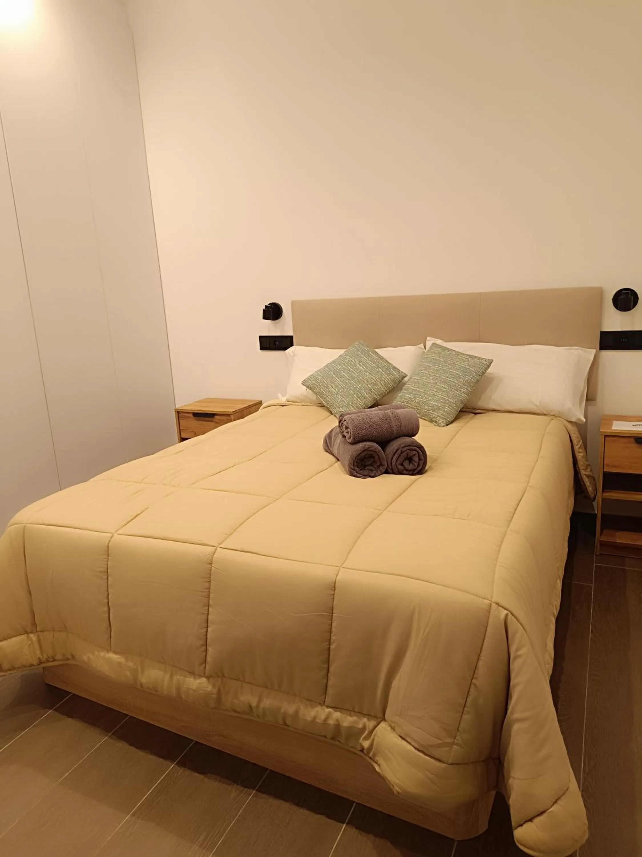 Bed in Alessi Suites & Studio