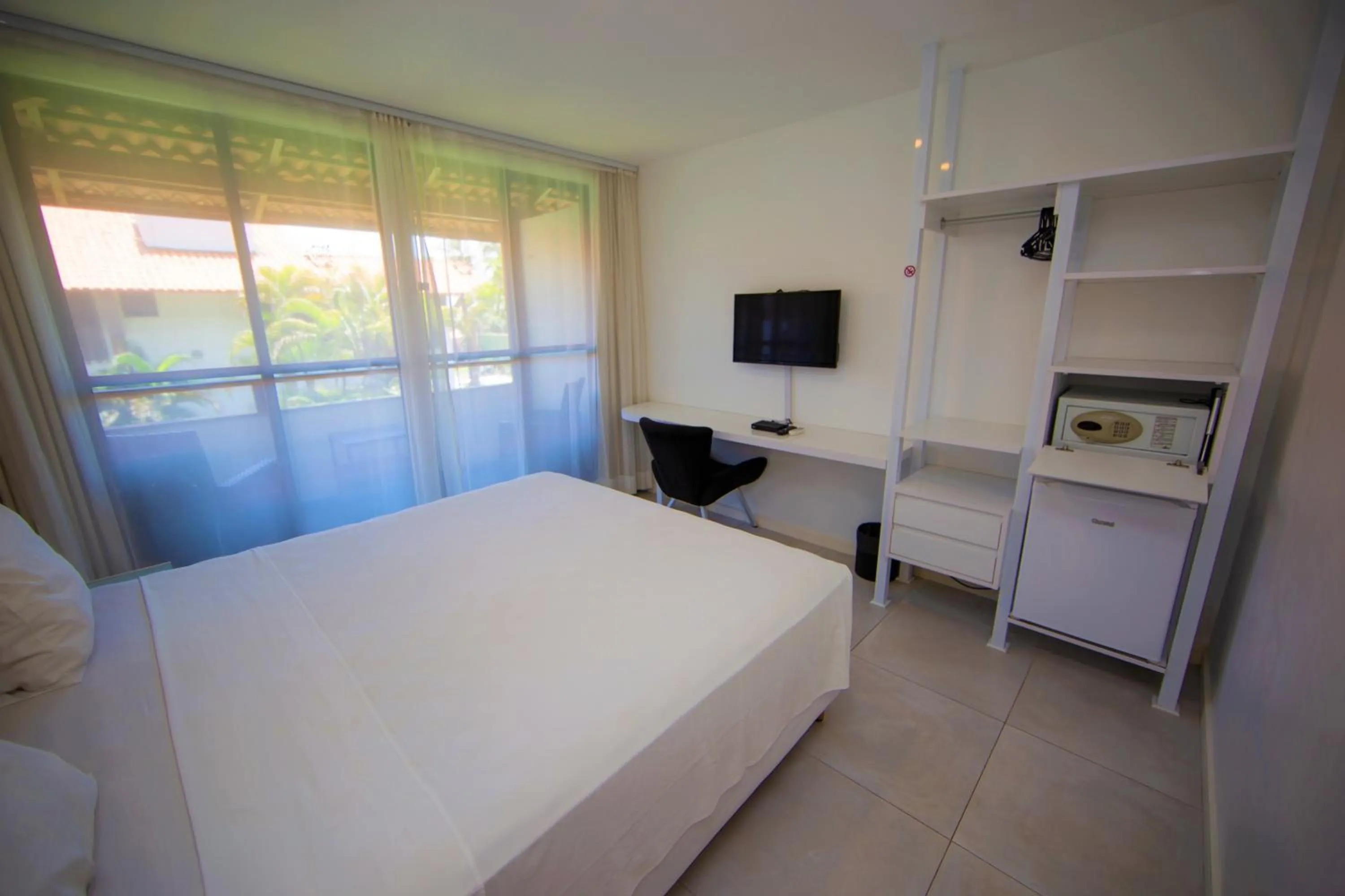 Bed in Duro Beach Garden Hotel