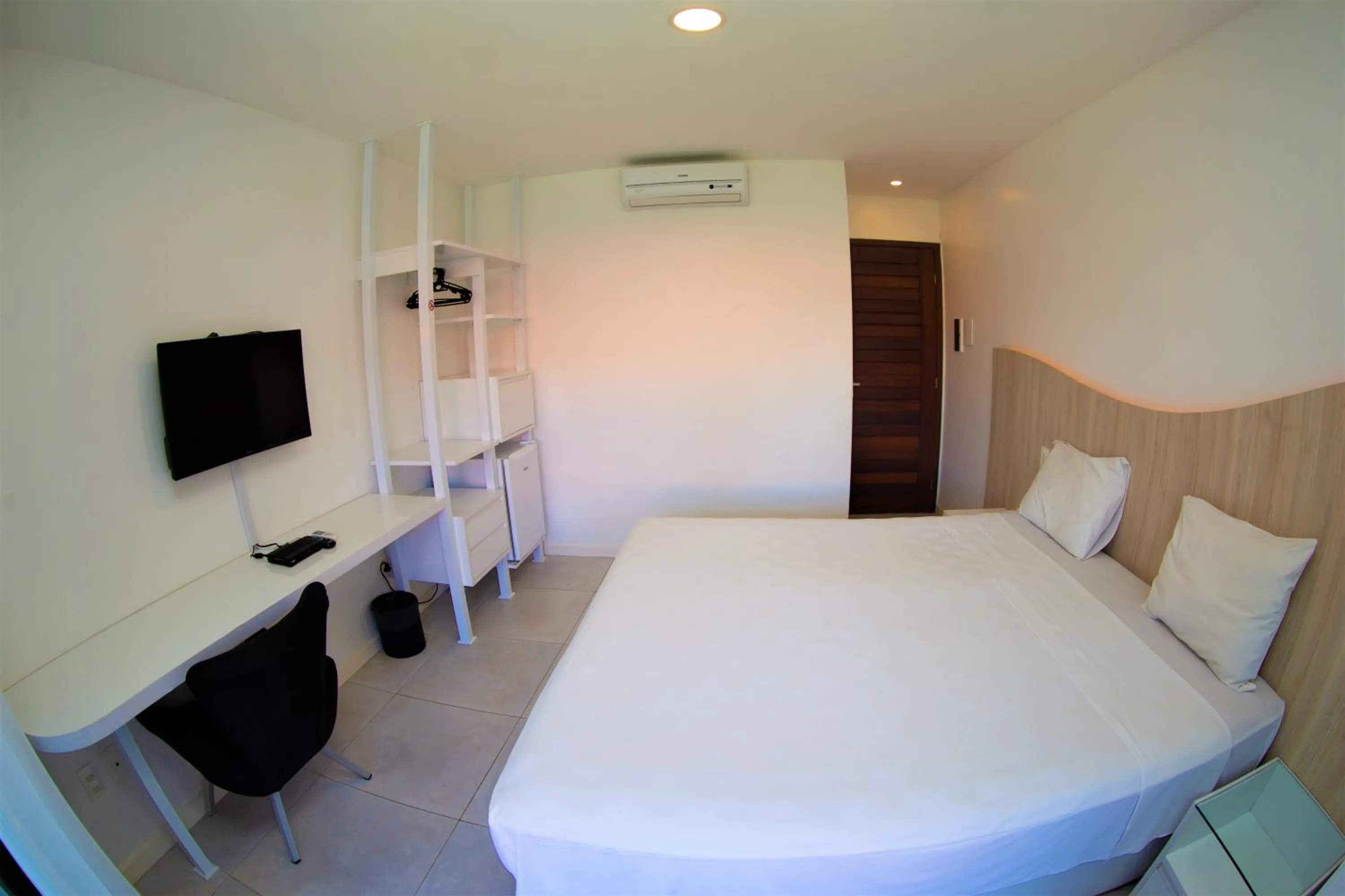 Bed in Duro Beach Garden Hotel