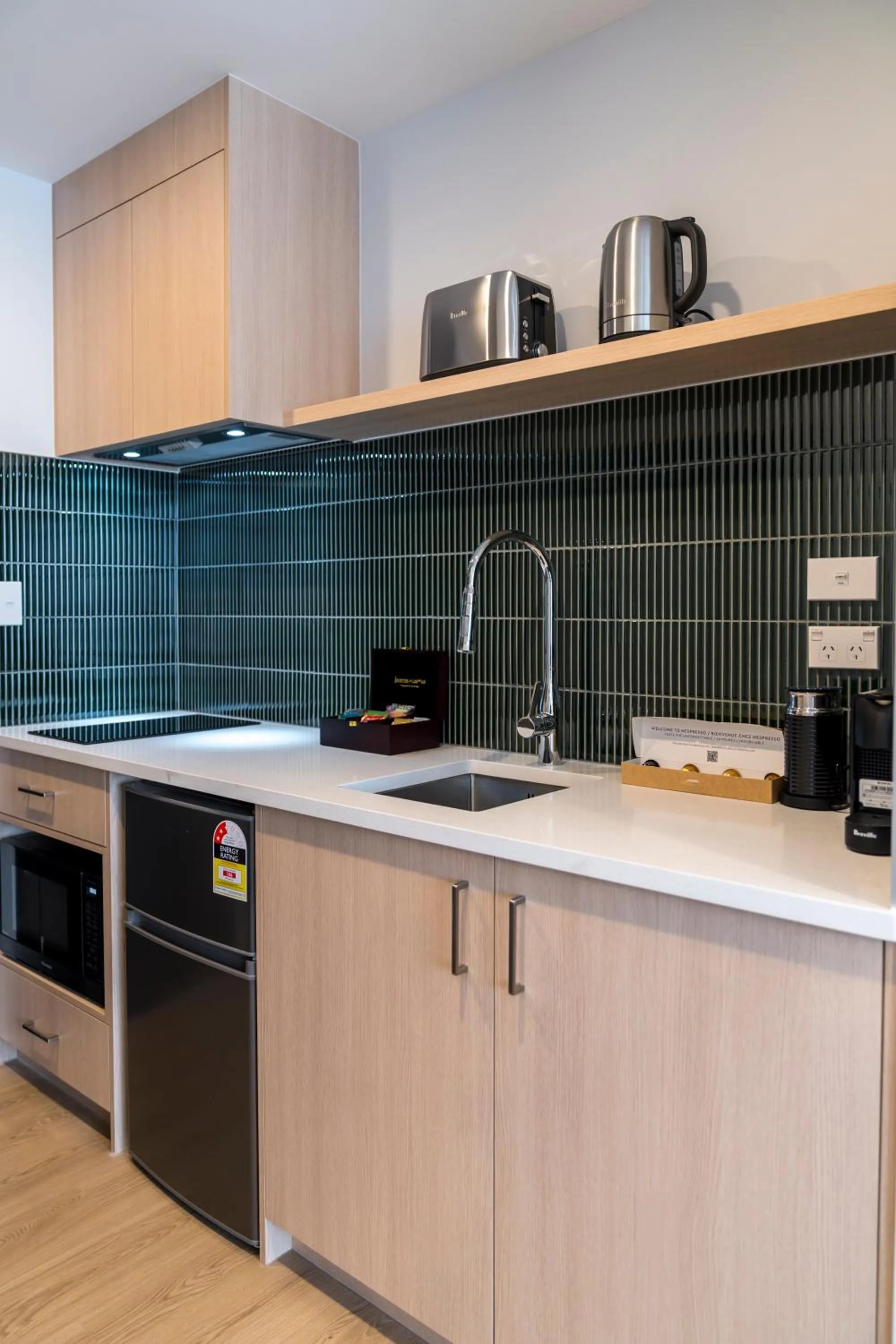 Kitchen or kitchenette in Takapuna International Motor Lodge