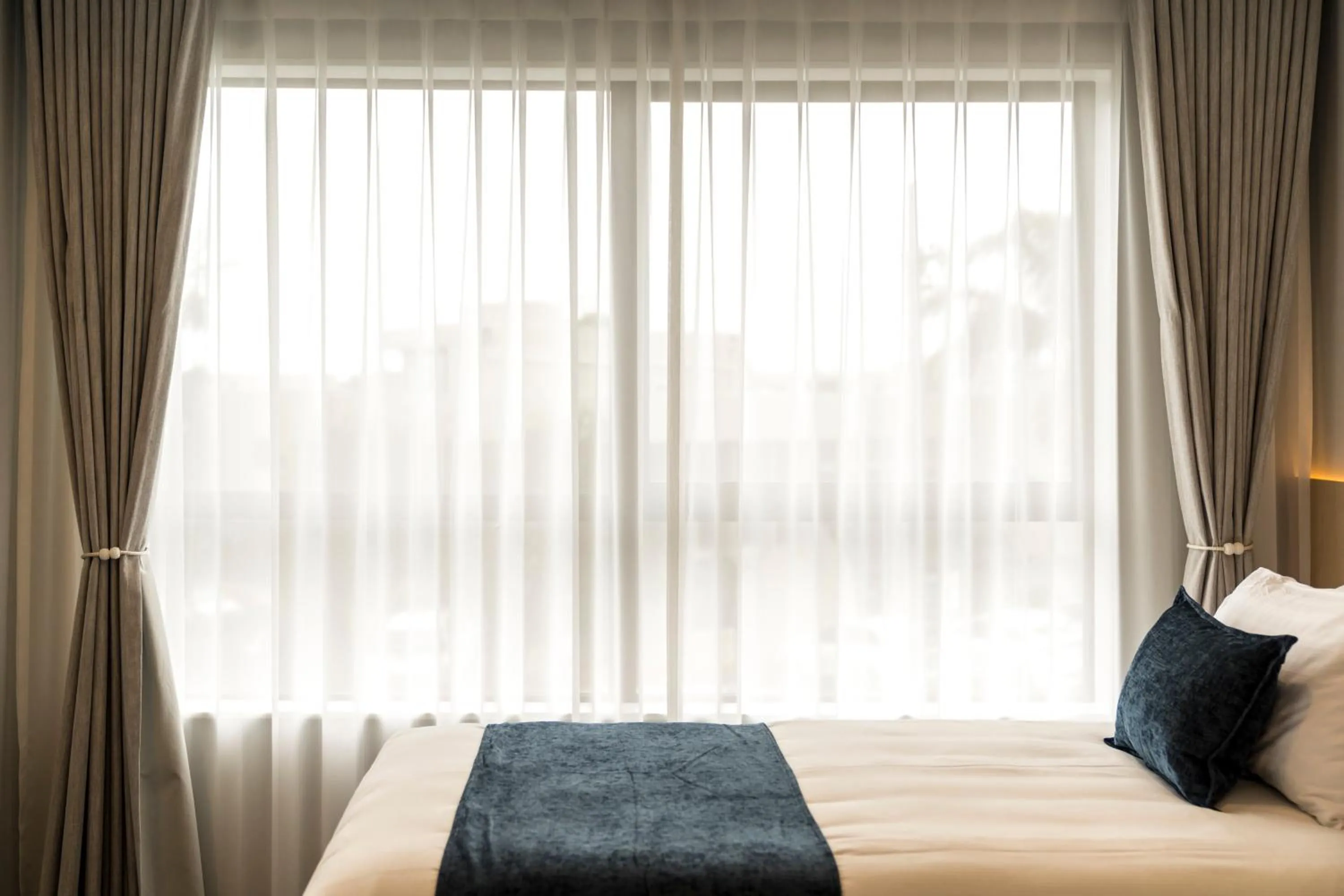 Bed in Takapuna International Motor Lodge