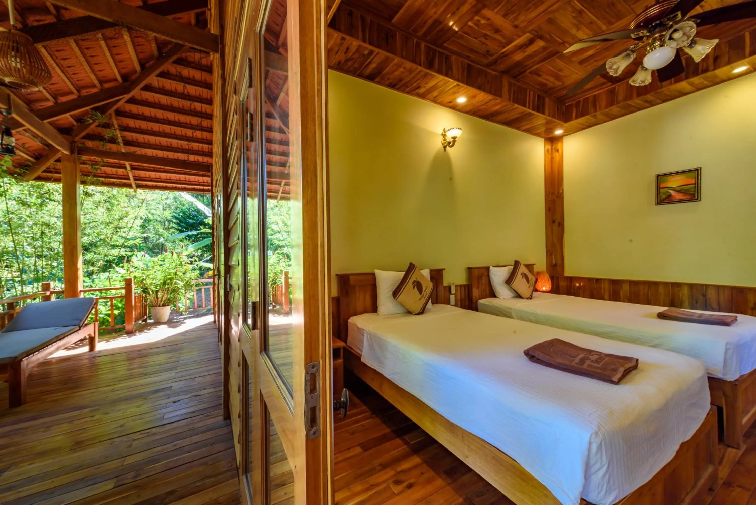 Bed in Mango Beach Resort