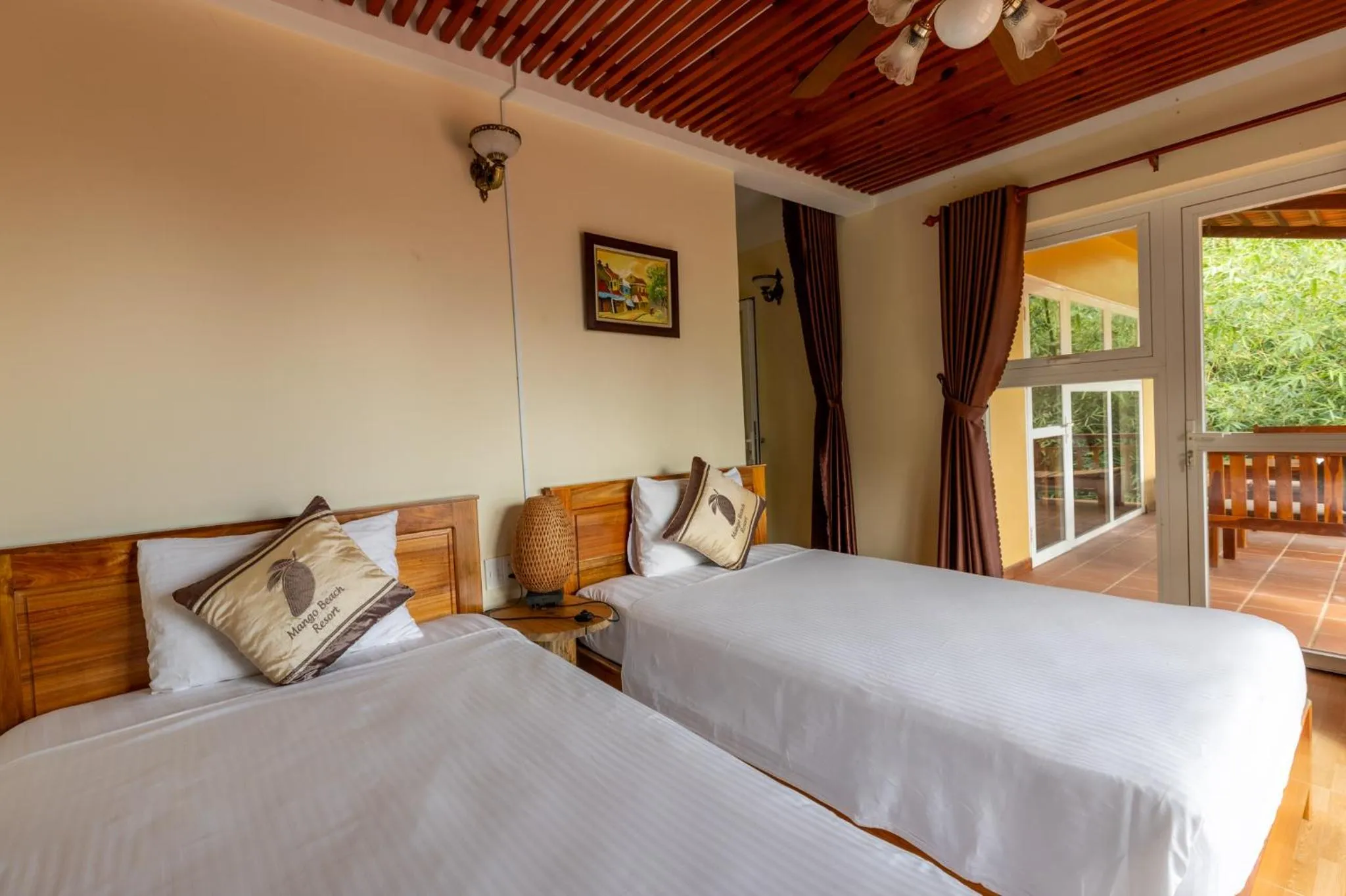 Bed in Mango Beach Resort