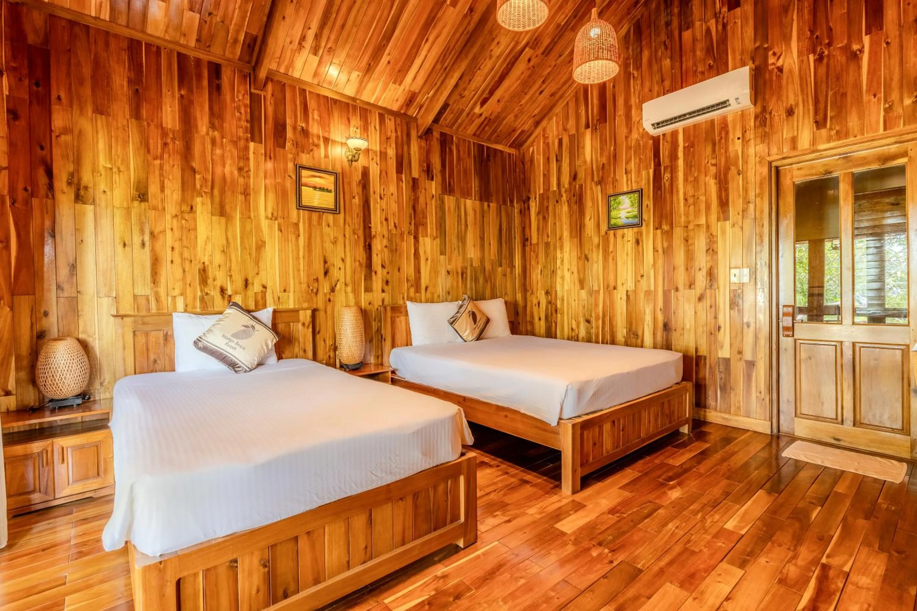 Bed in Mango Beach Resort