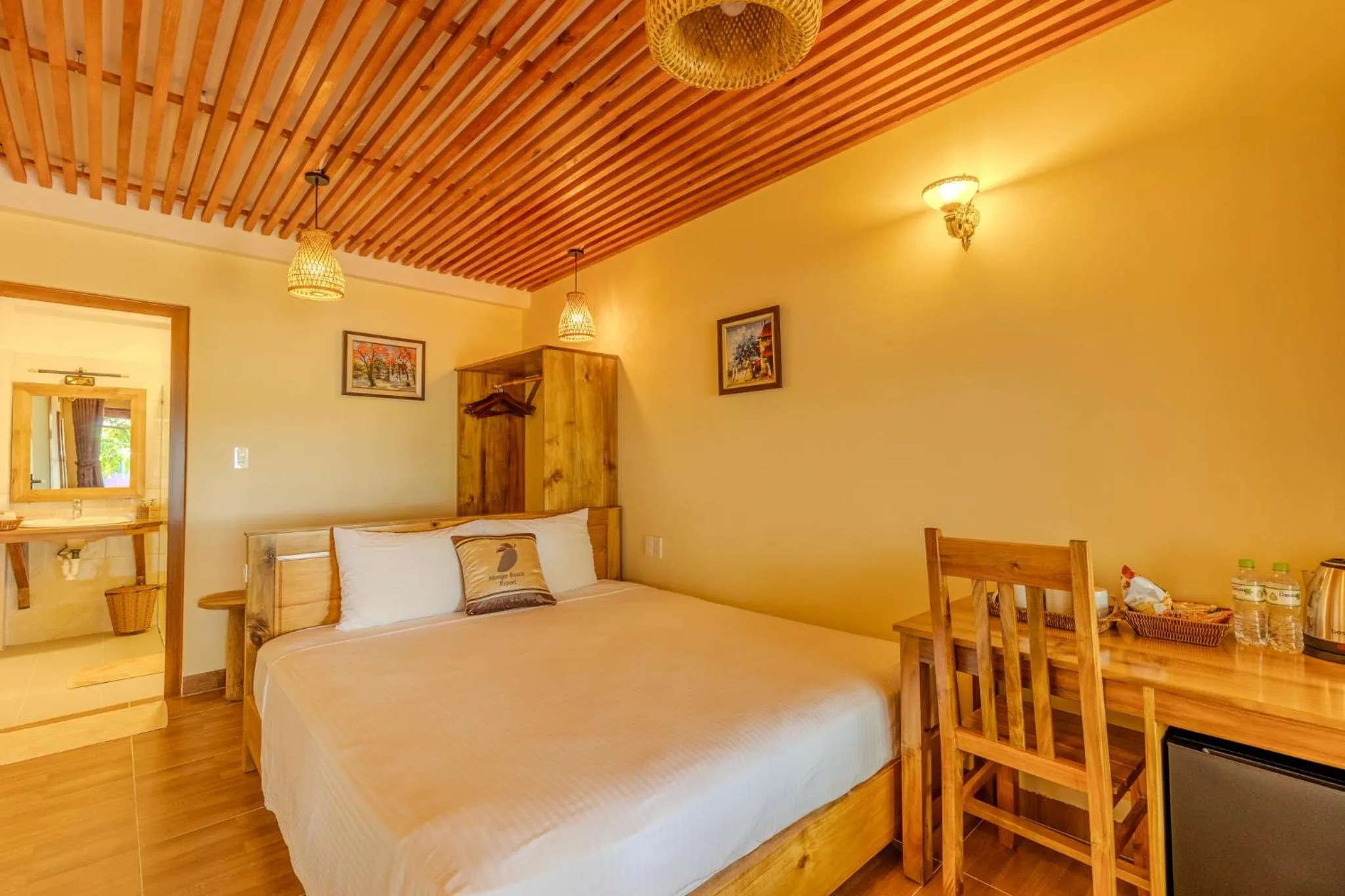 Bed in Mango Beach Resort