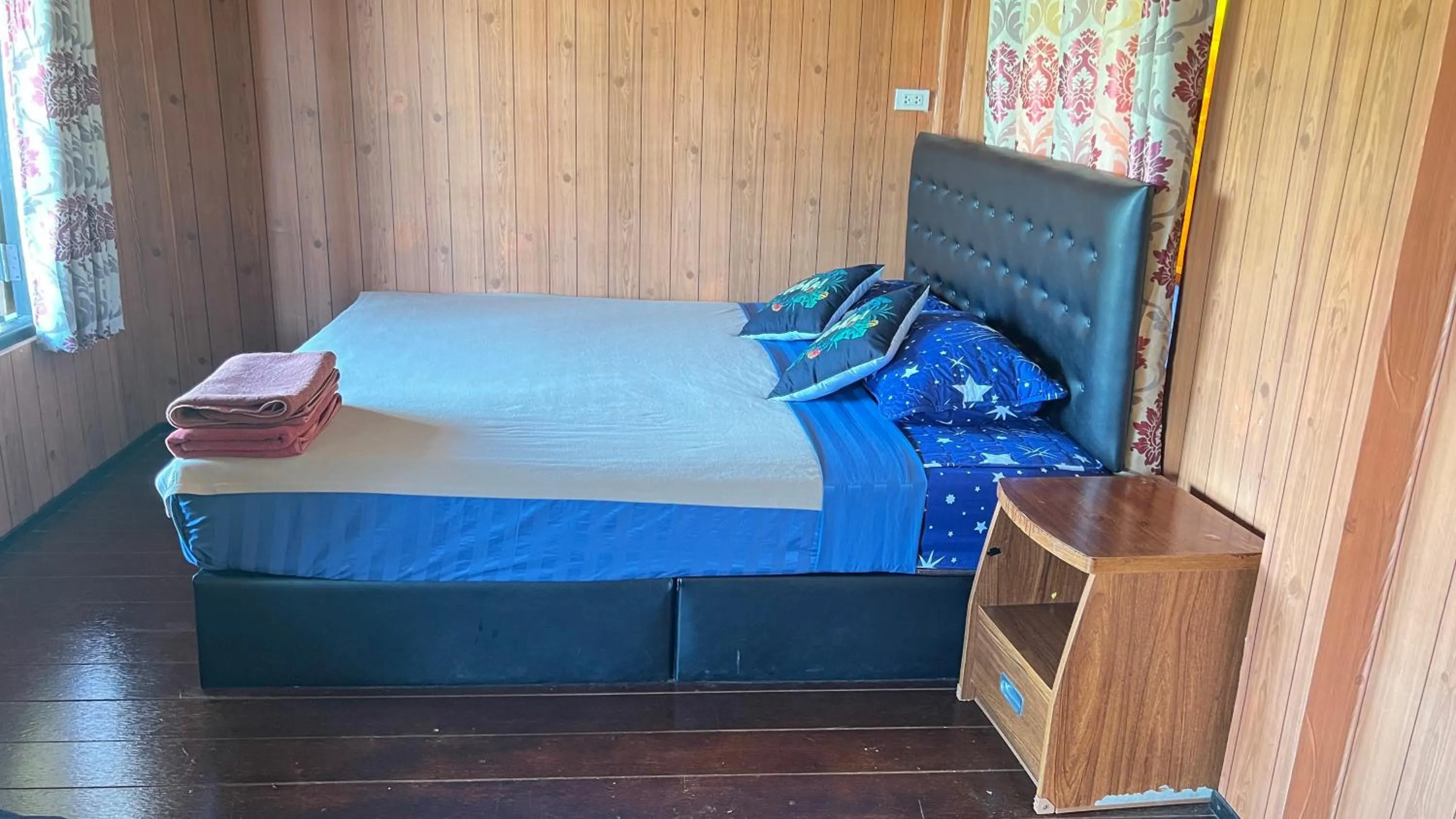 Bed in Chom Dao Resort
