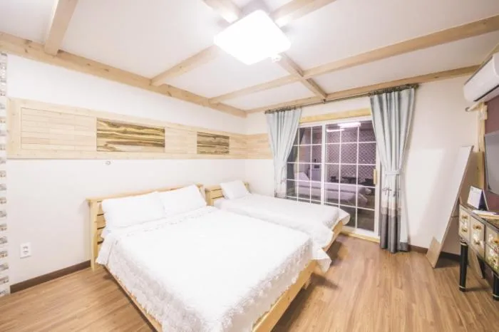 Bed in Red Windmill Pension