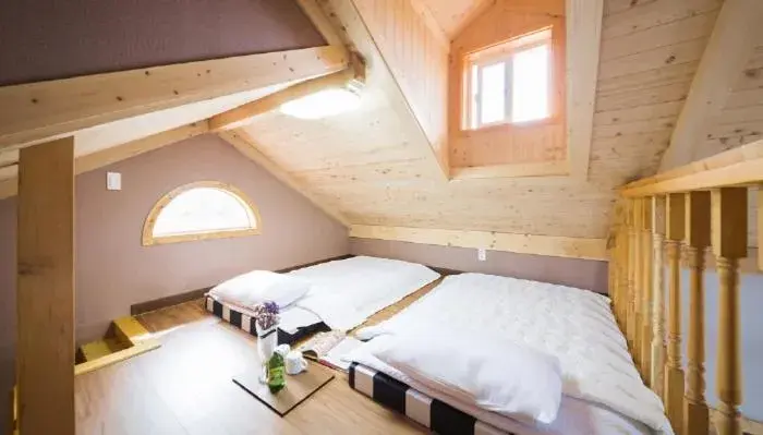 Bed in Red Windmill Pension Bed in Red Windmill Pension