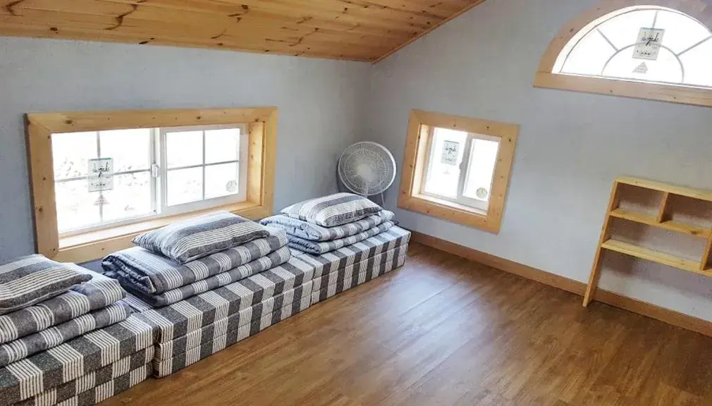 Bed in Red Windmill Pension Bed in Red Windmill Pension