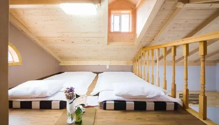 Bed in Red Windmill Pension Bed in Red Windmill Pension