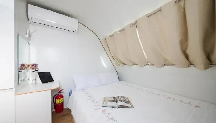 Bed in Red Windmill Pension Bed in Red Windmill Pension