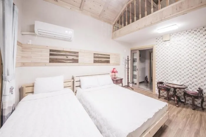 Bed in Red Windmill Pension