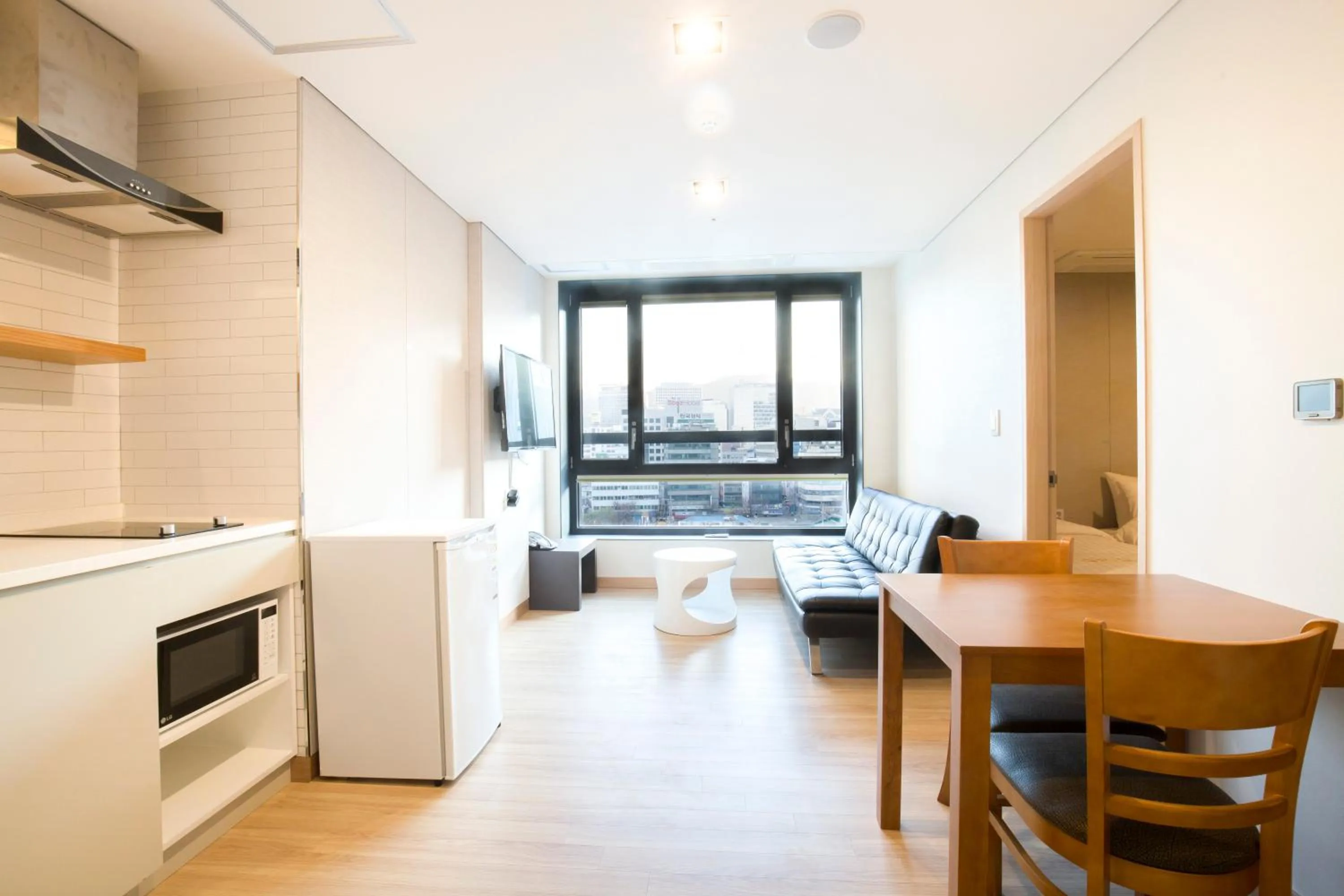 Living room in Grid Inn Hotel