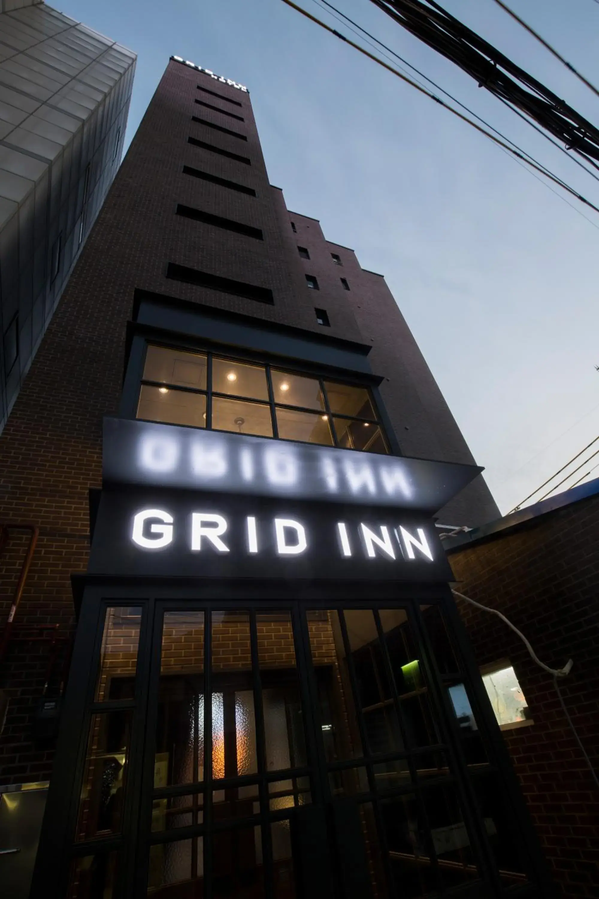 Facade/entrance in Grid Inn Hotel Facade/entrance in Grid Inn Hotel