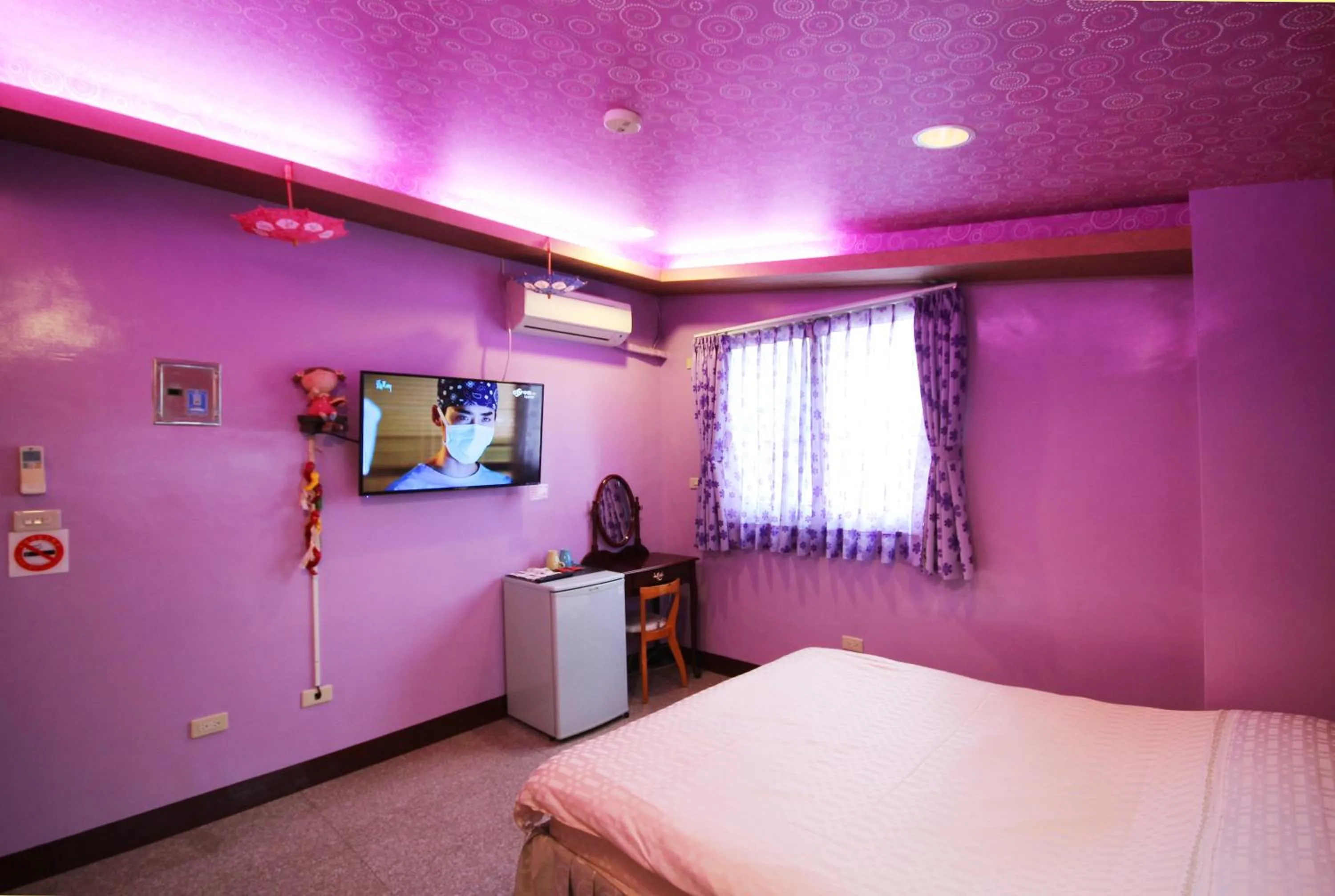 Bed in Pingguo De Jia Du Jia Homestay