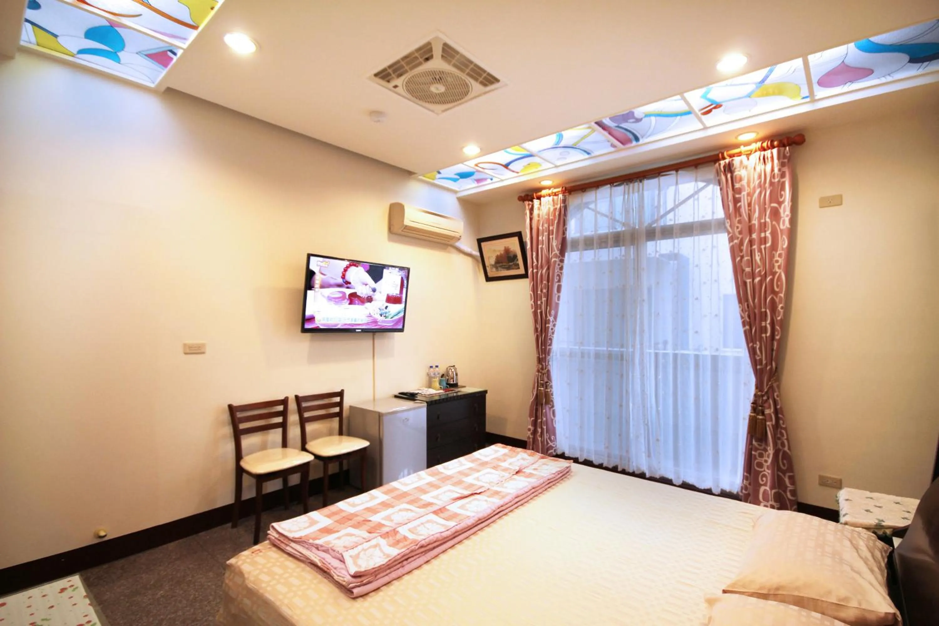 Bed in Pingguo De Jia Du Jia Homestay