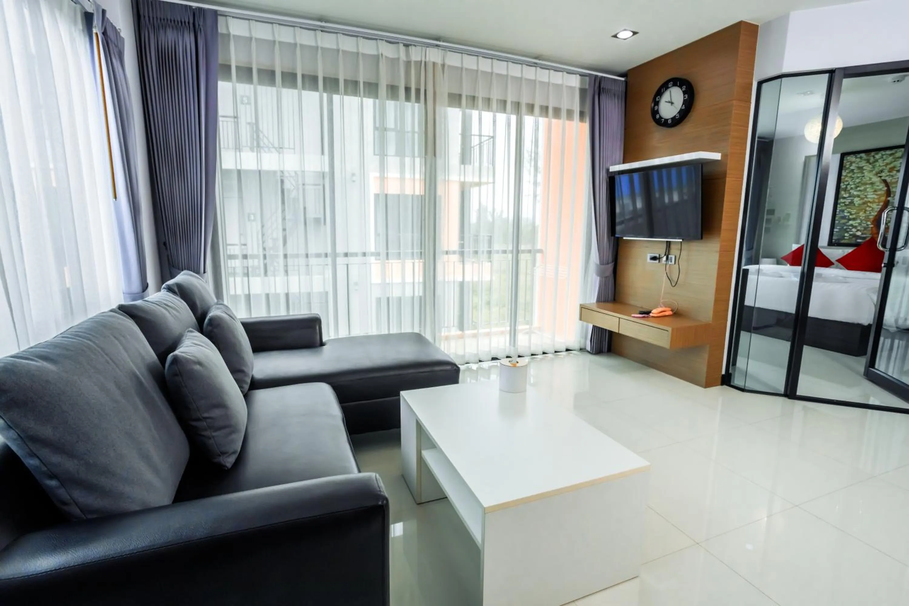 Communal lounge/ TV room in The Lucky Beach Ao Nang